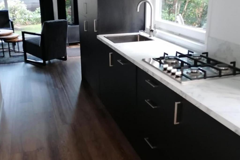 Modern gezinsvriendelijke chalet op de Veluwe view 5