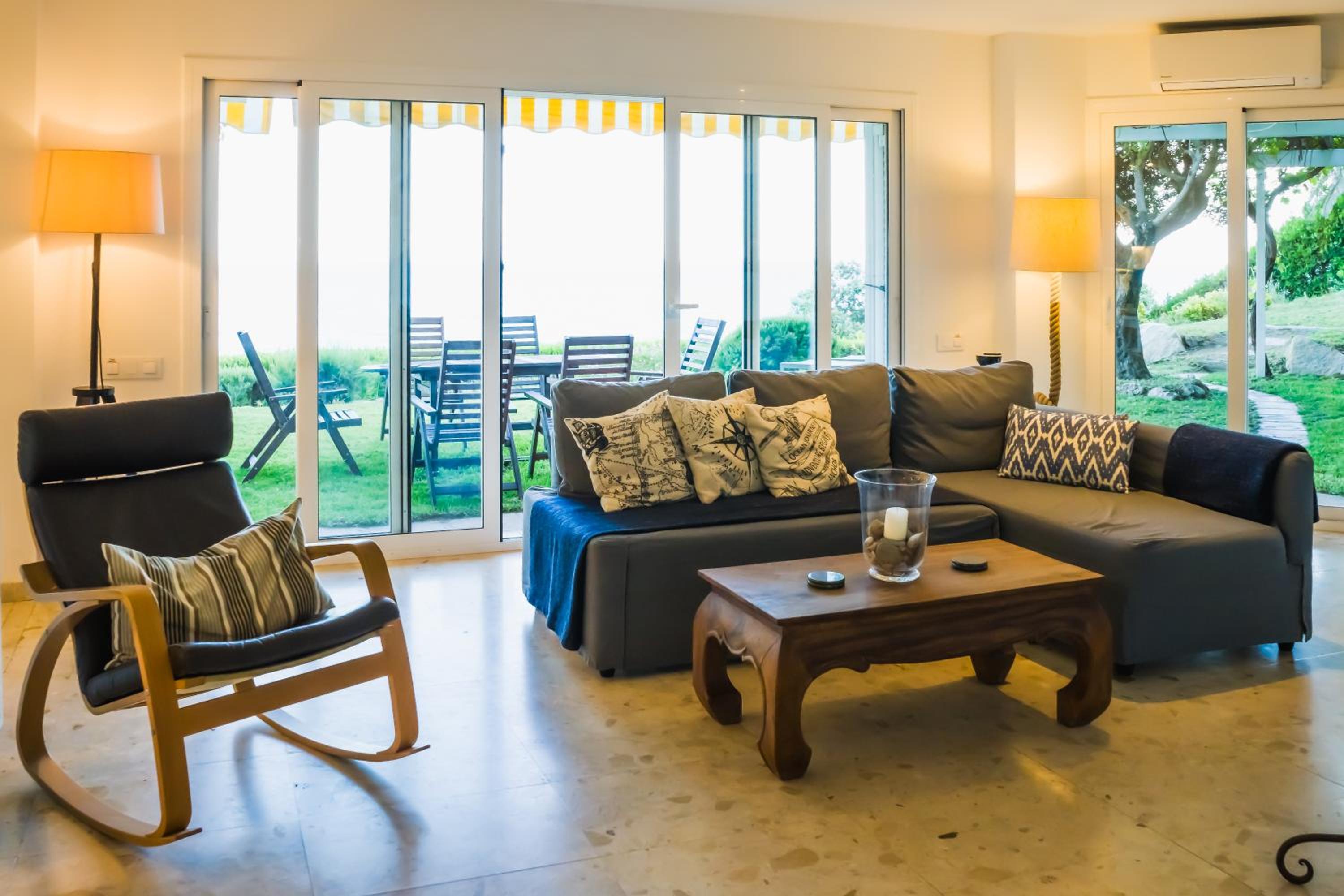 Fantástica casa frente al mar con jardín privado