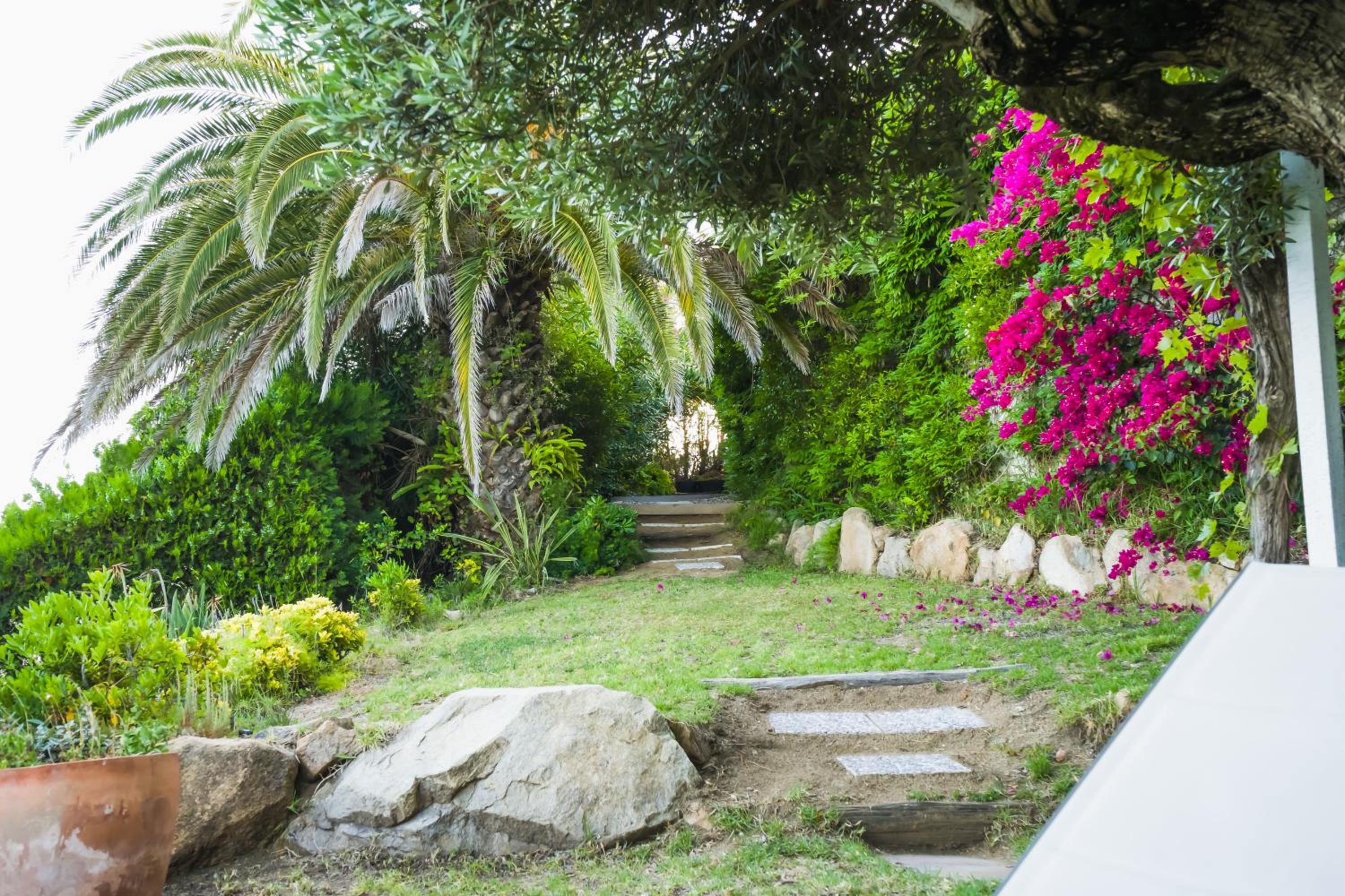 Fantástica casa frente al mar con jardín privado