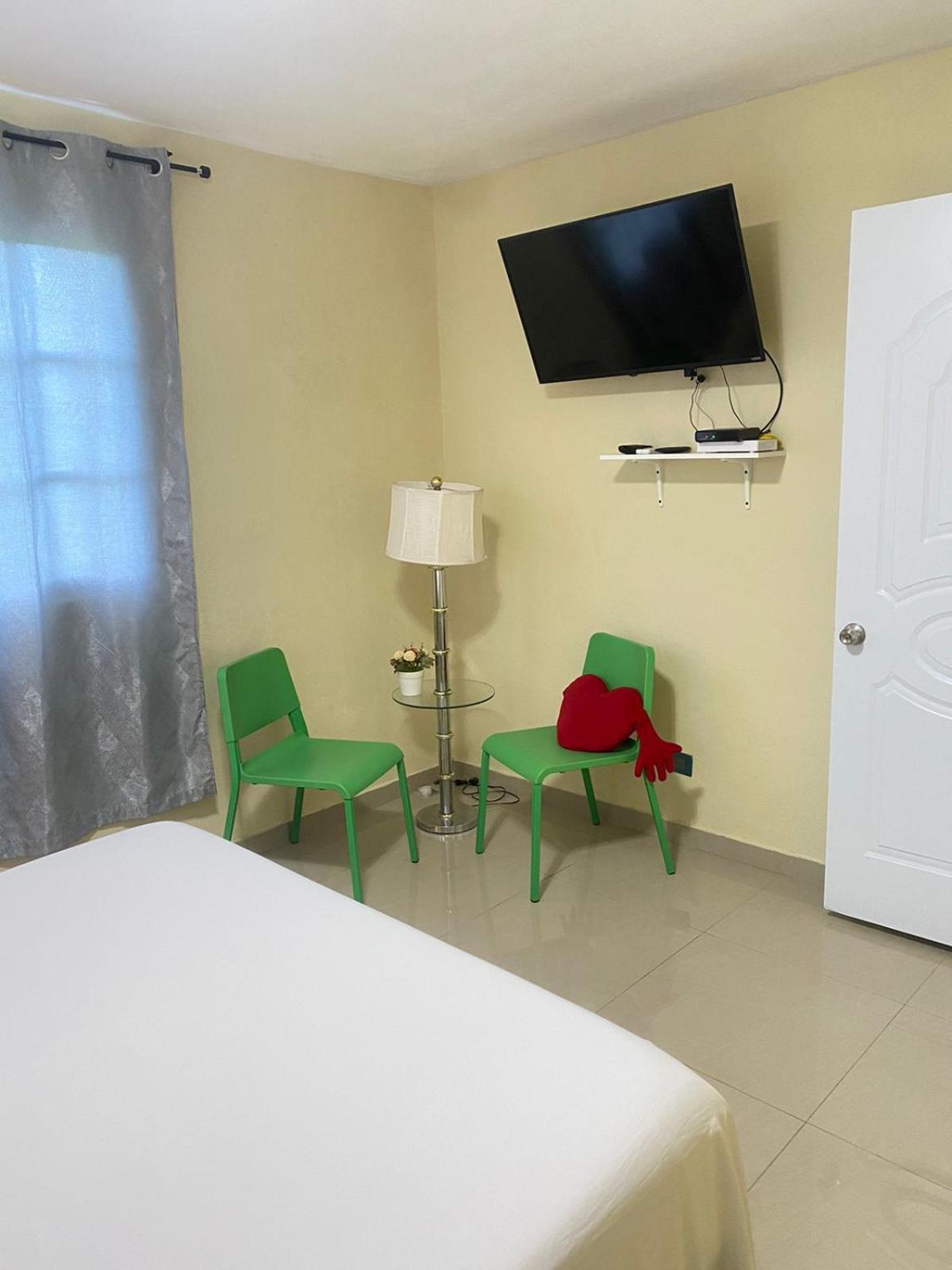 Tiny Apartment By Merengue House ,8 minutos airport view 5