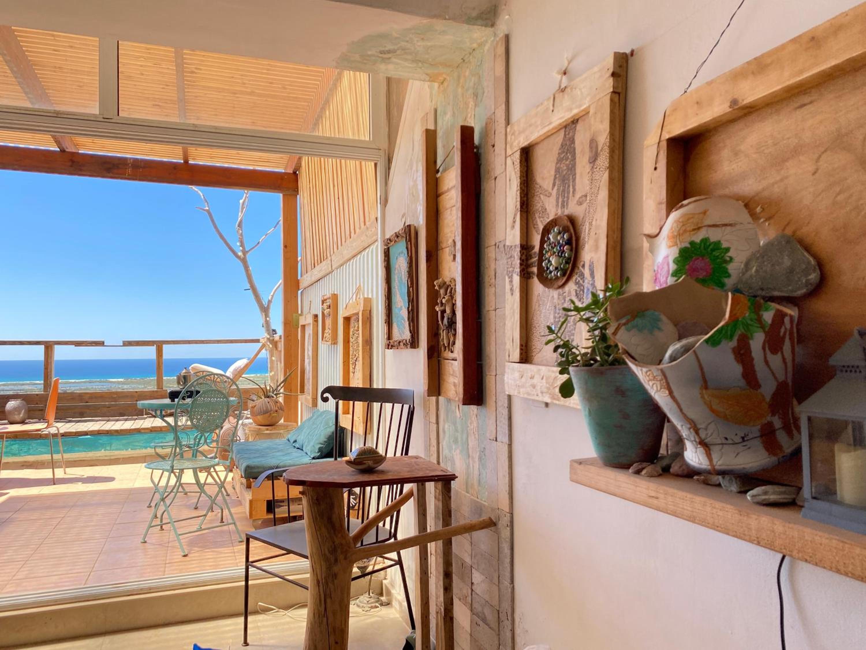 Artistic Sea View Getaway with Hot Tub