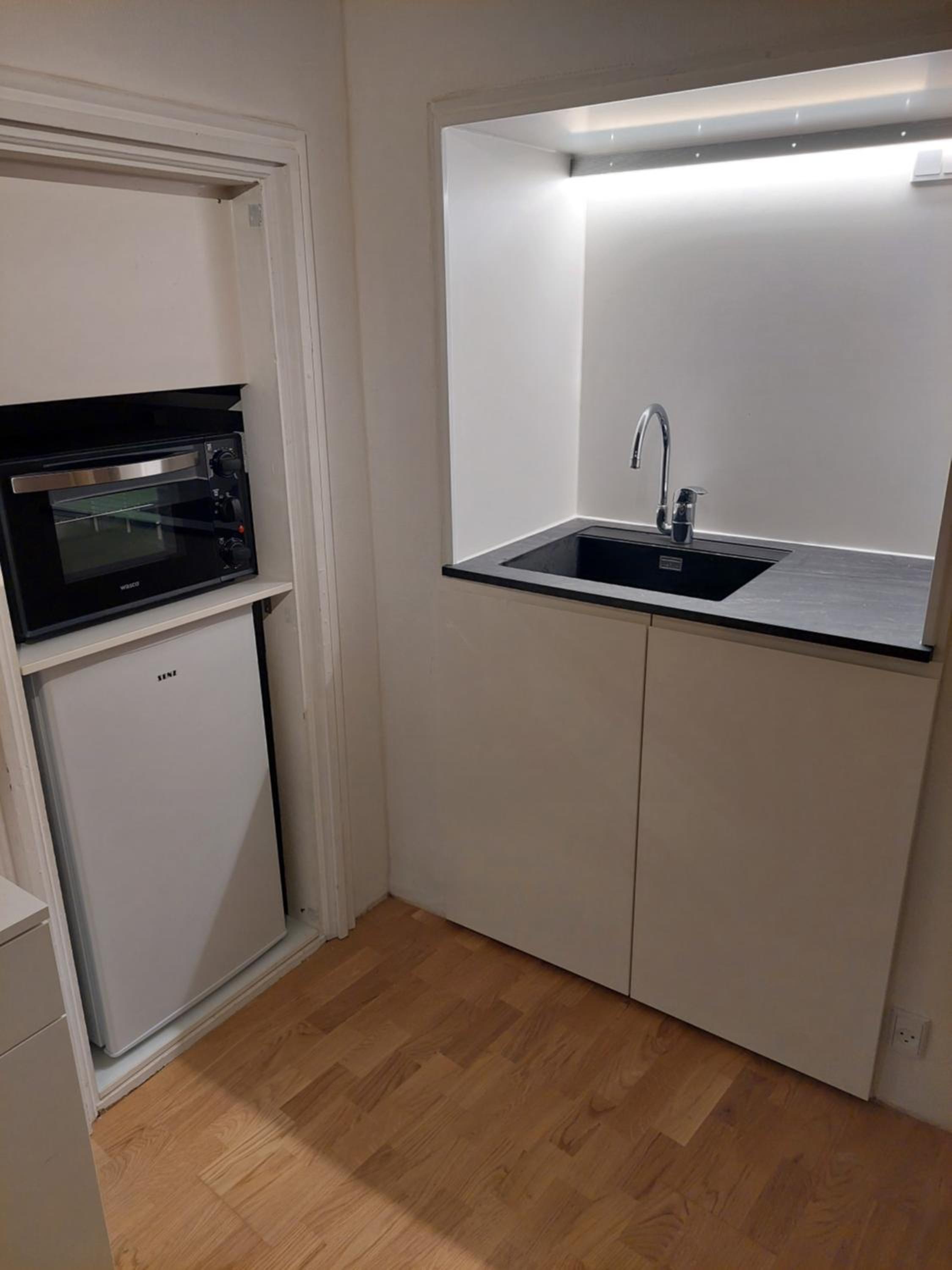 Hyggelig lejlighed i baggård