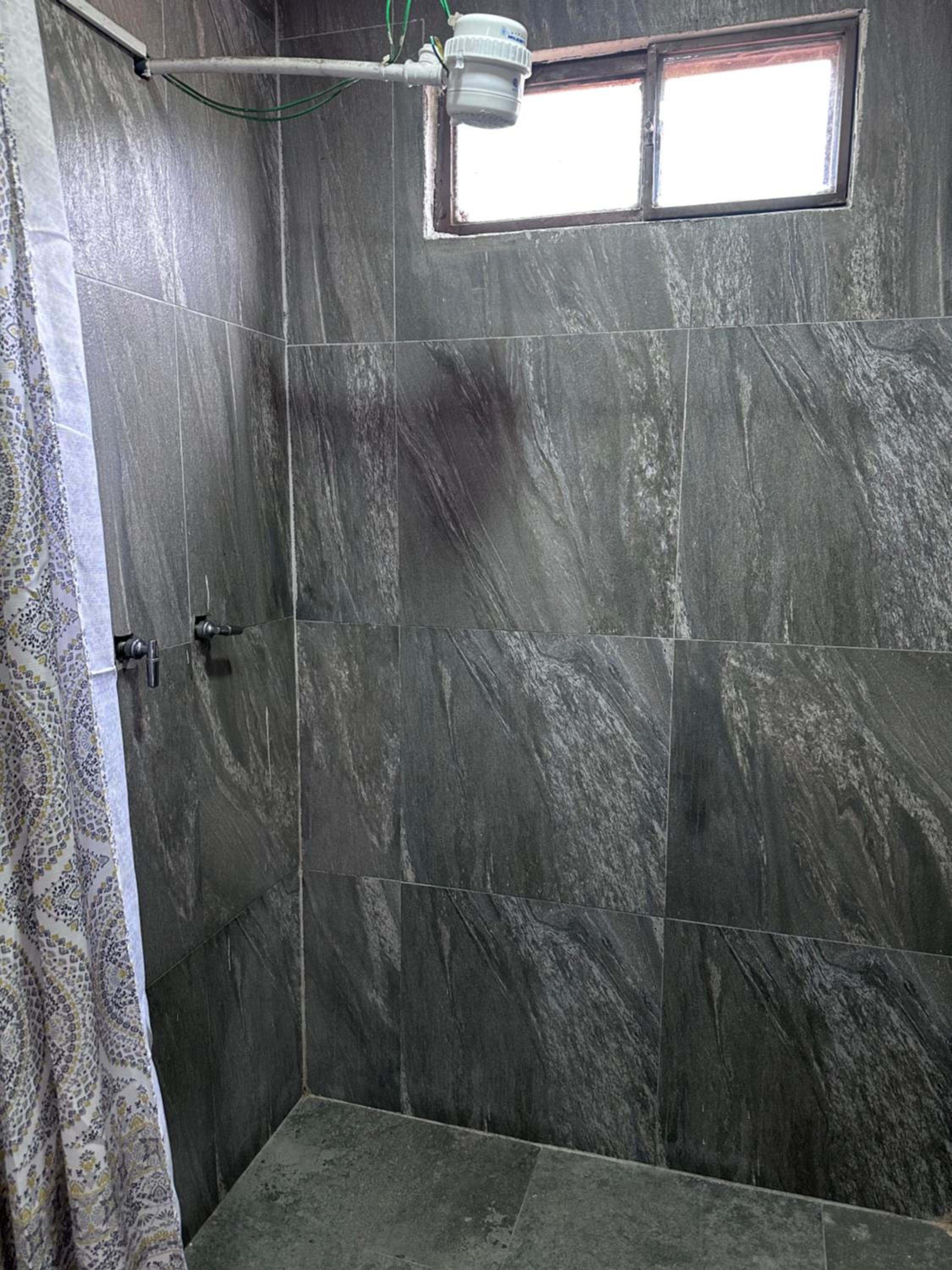 Baños de Agua Santa cocina completa y parqueadero gratis