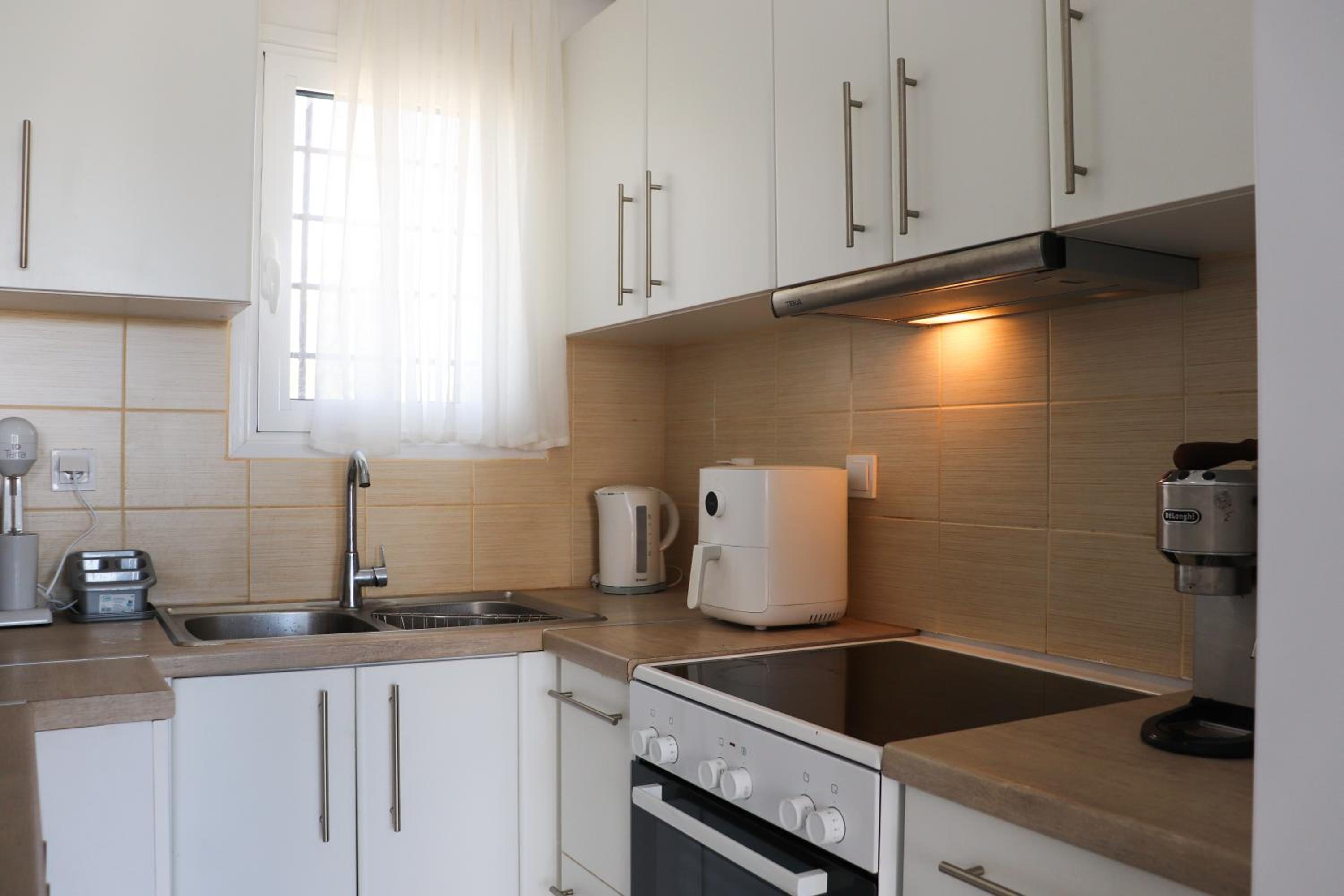 Ateni House
