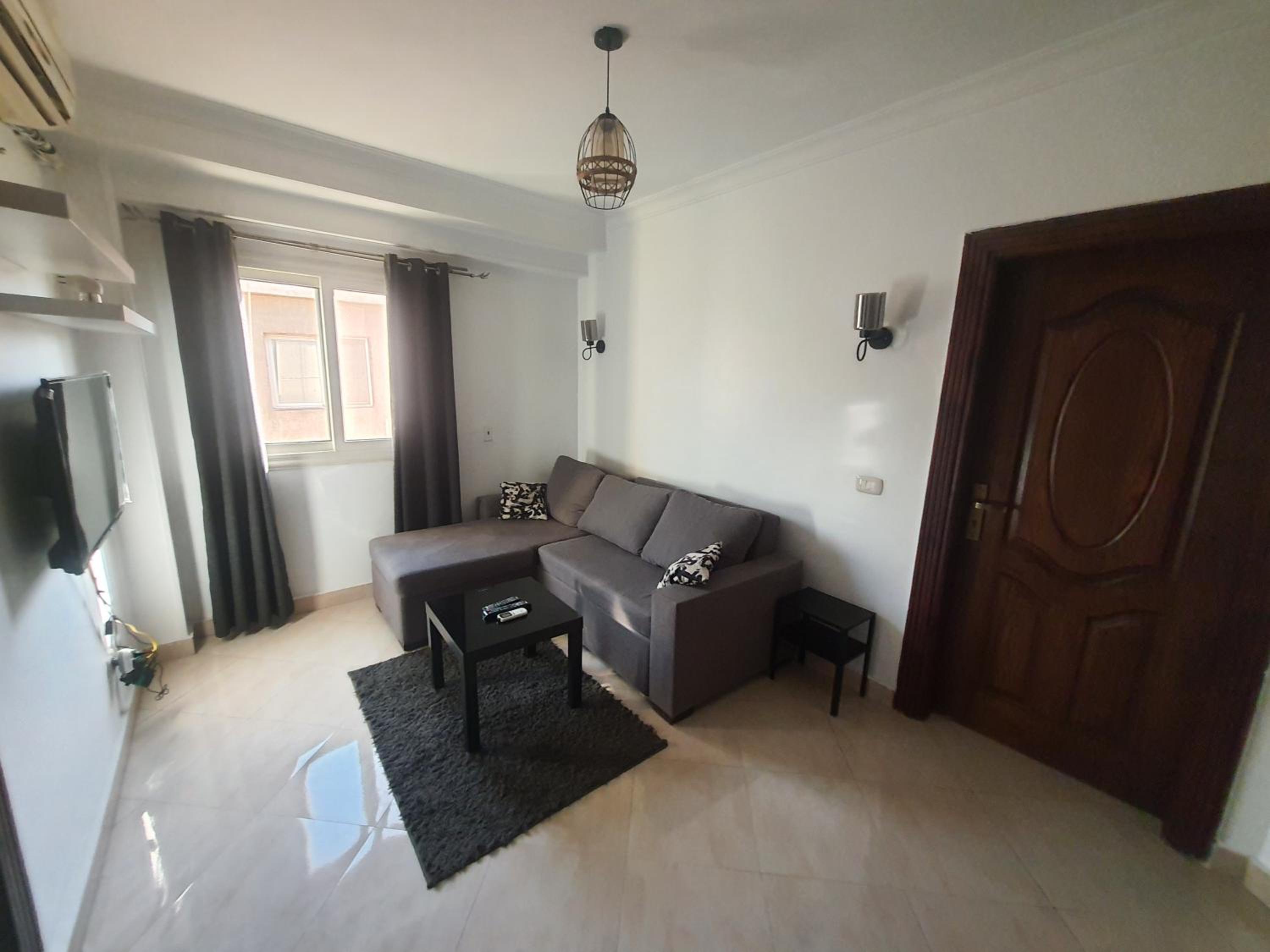 A stylish cozy apartment close to Cairo airport.