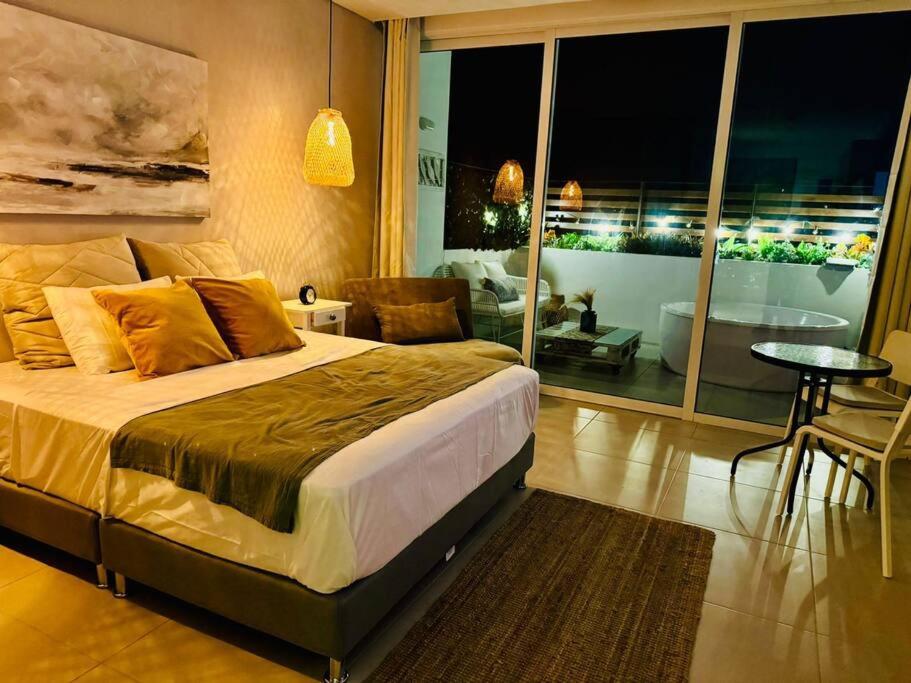 Suite con terraza y jacuzzi Bello horizonte
