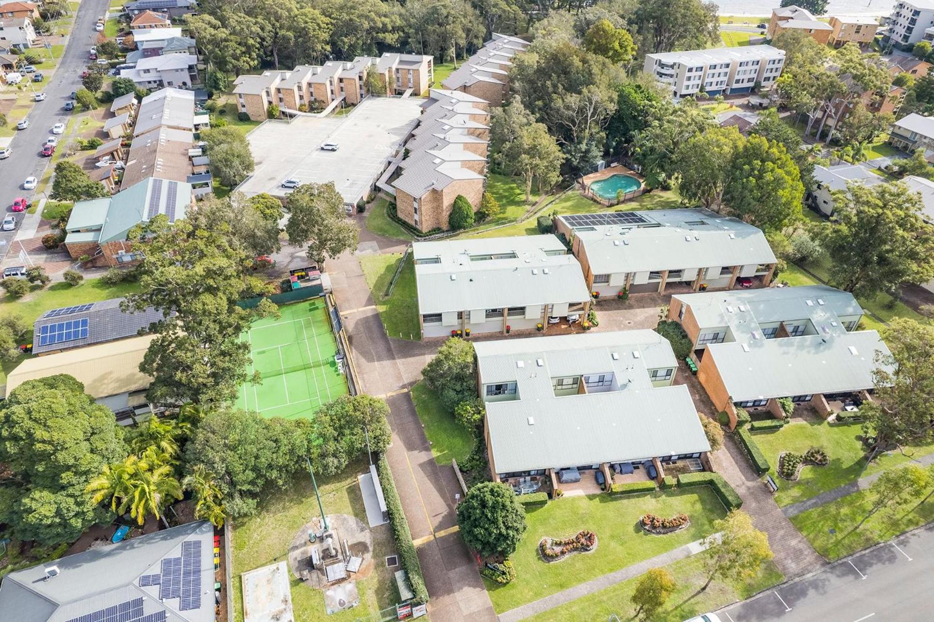 Bay Parklands 57 ground floor unit with pool tennis court and aircon