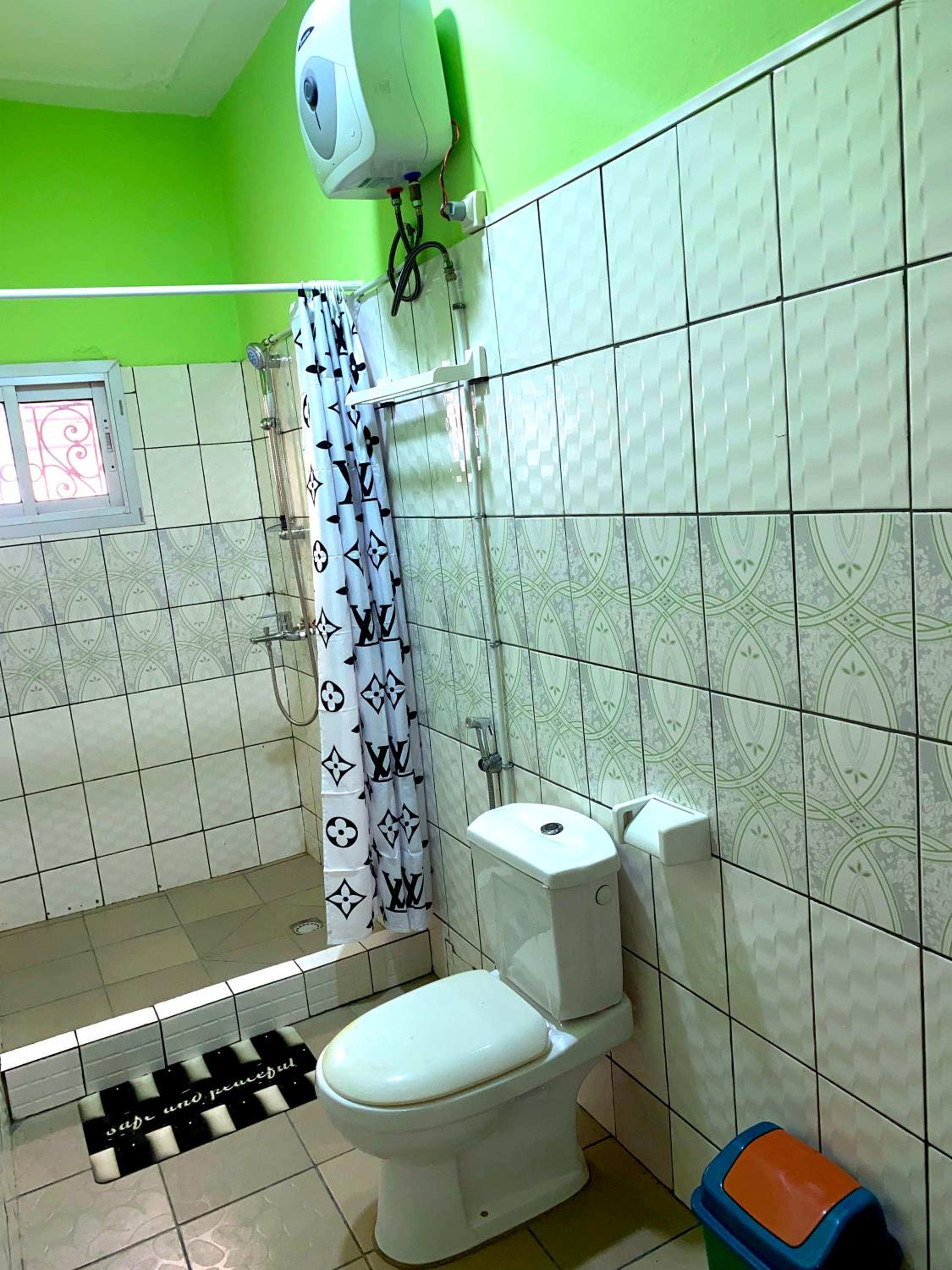 Suite Premium à Makepe, Groupe électrogène, Wifi, Climatisée, Secure