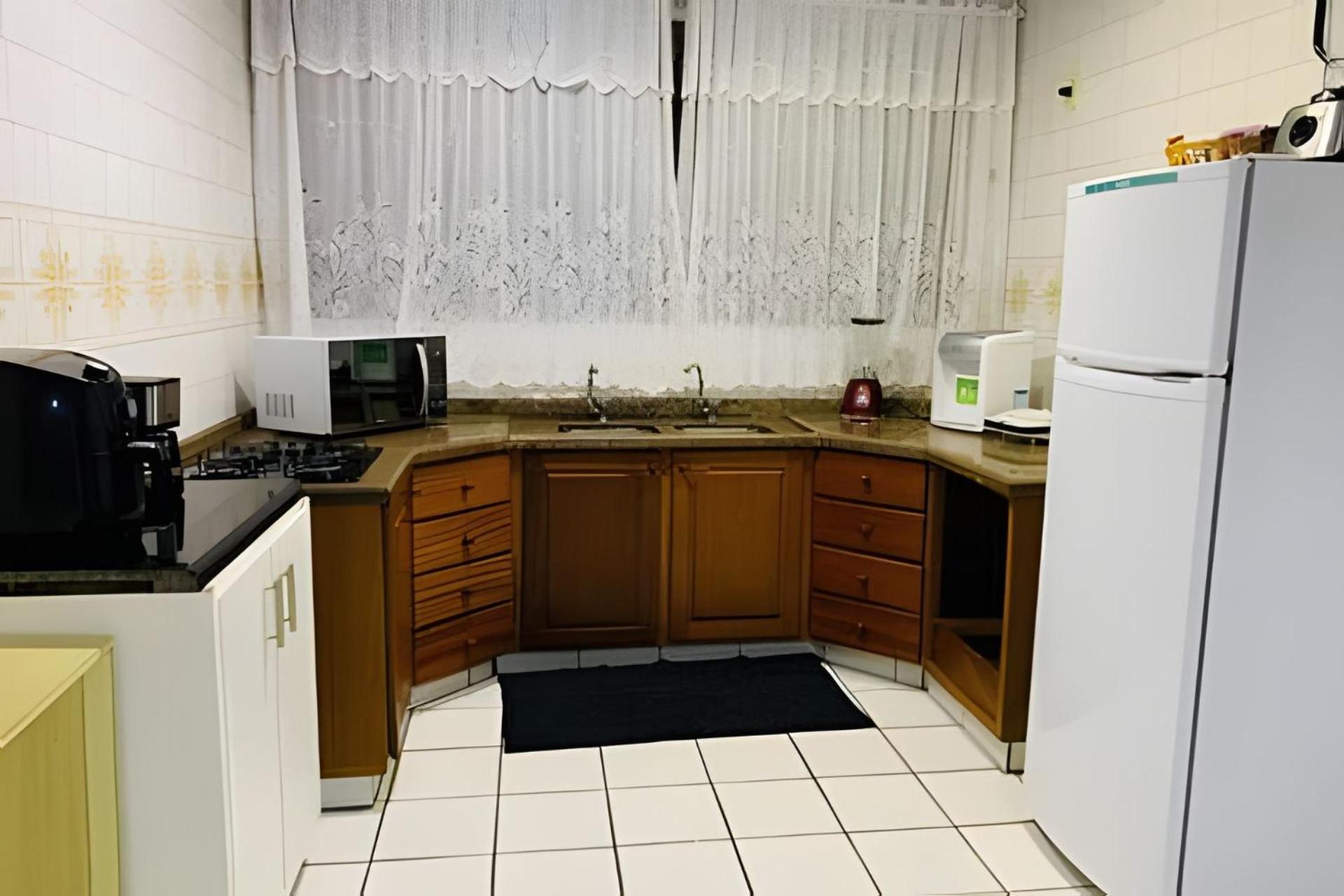 Casa com 2 suites 2 quartos ar e churrasqueira