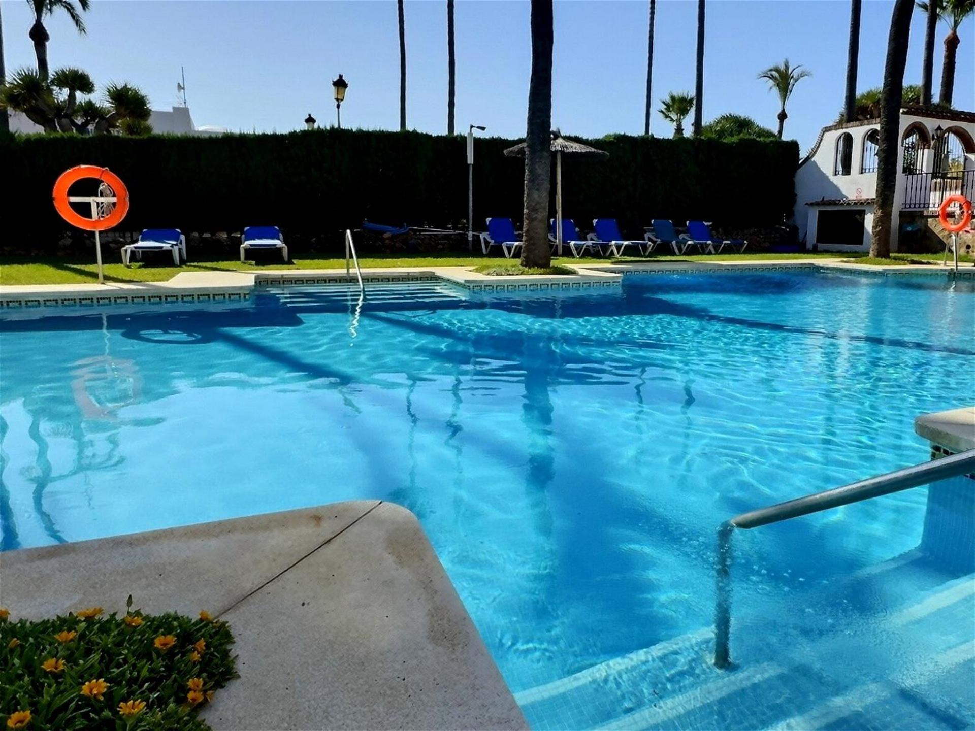 Marina Magic Two Bedroom, Two-Bathroom Apartment Steps from Duquesa Harbour and the Beach