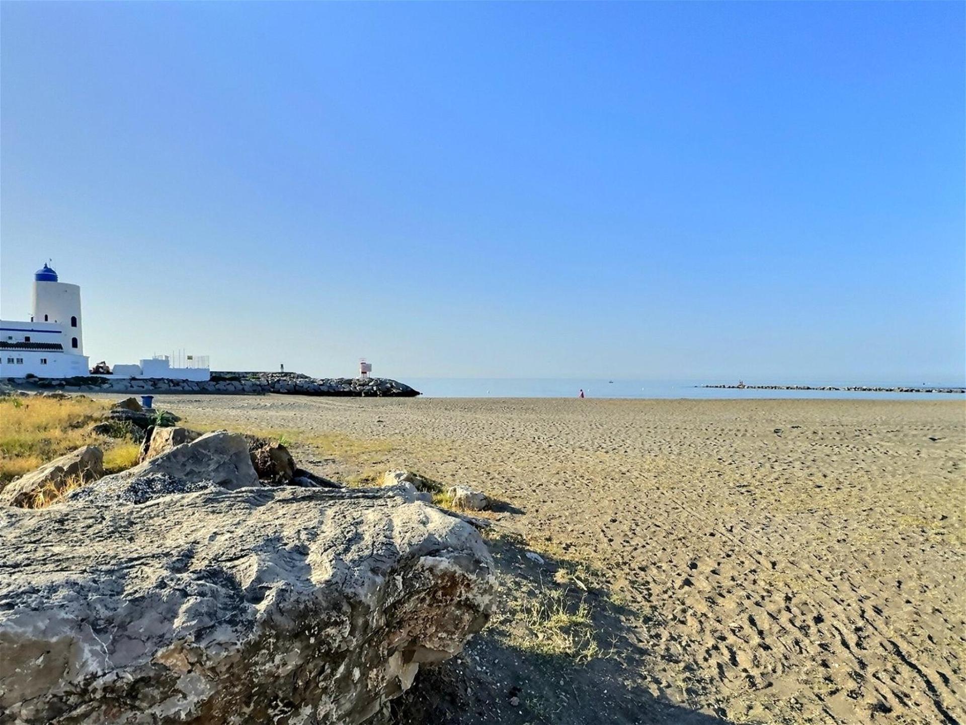 Marina Magic Two Bedroom, Two-Bathroom Apartment Steps from Duquesa Harbour and the Beach