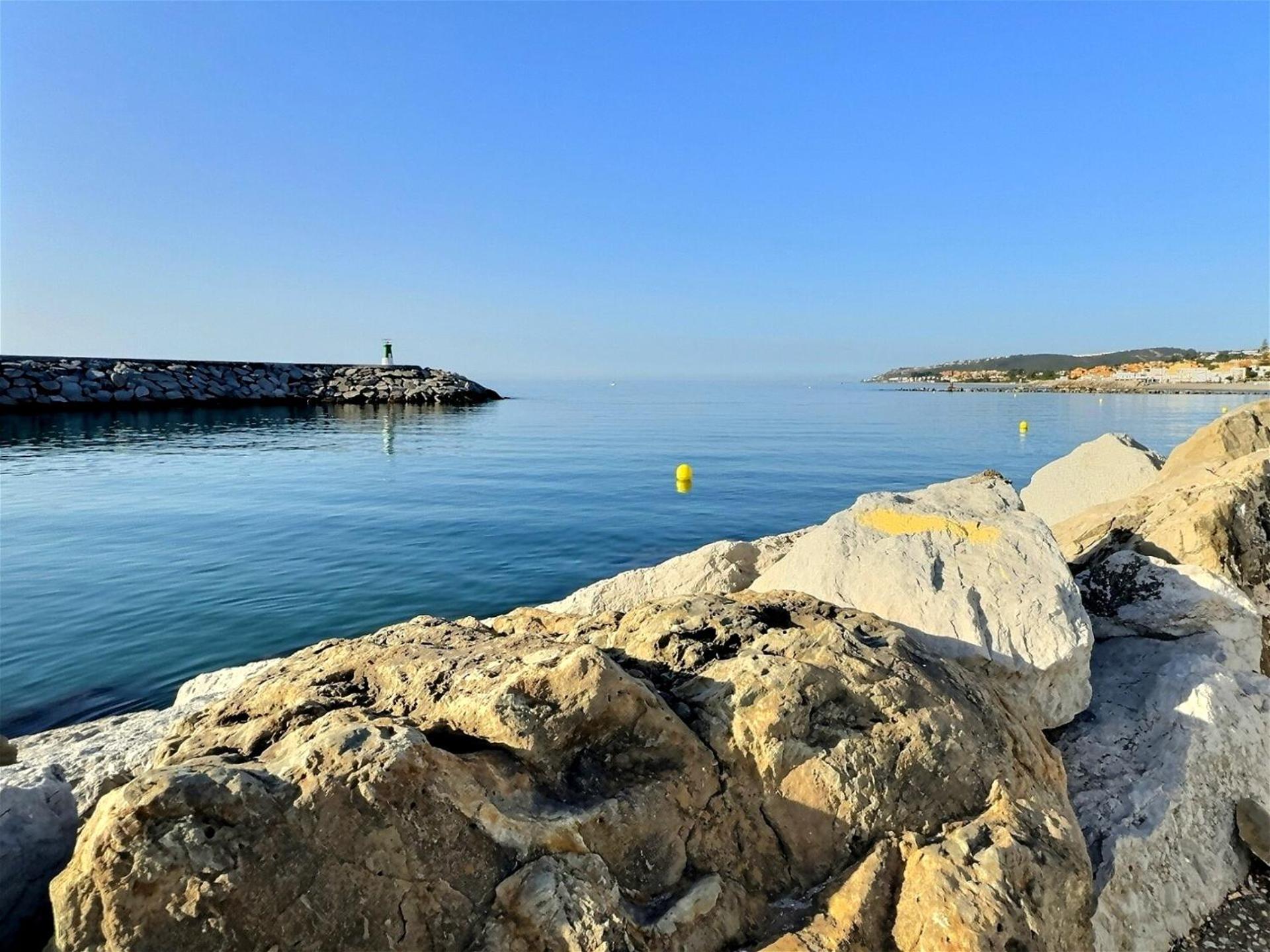 Marina Magic Two Bedroom, Two-Bathroom Apartment Steps from Duquesa Harbour and the Beach