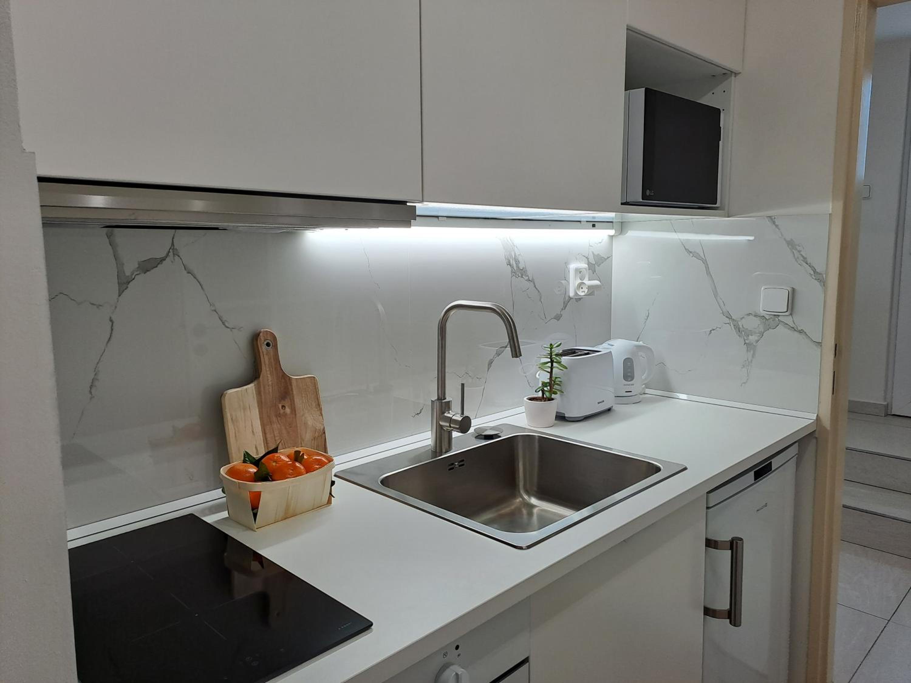 Apartmánový dům se zahradou v klidné části Prahy