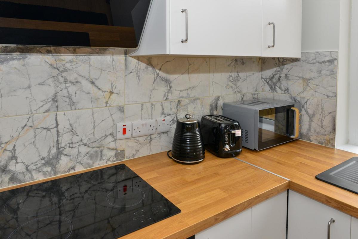 Esterville Apartments 1 and 2 bedrooms hot tub availability view 3