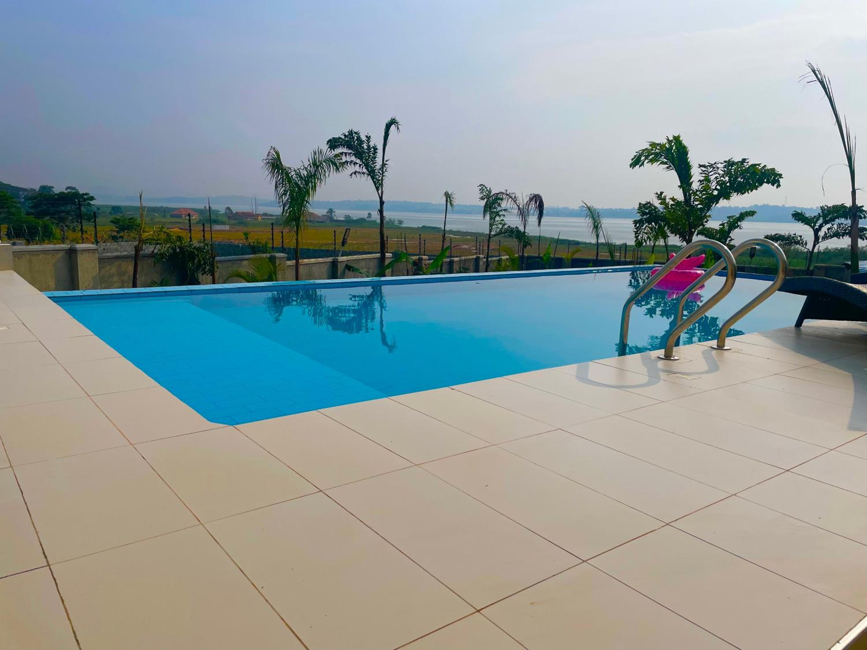 Infinity Pool Villas , Entebbe airport shuttle free parking private pool wifi 24 hr security