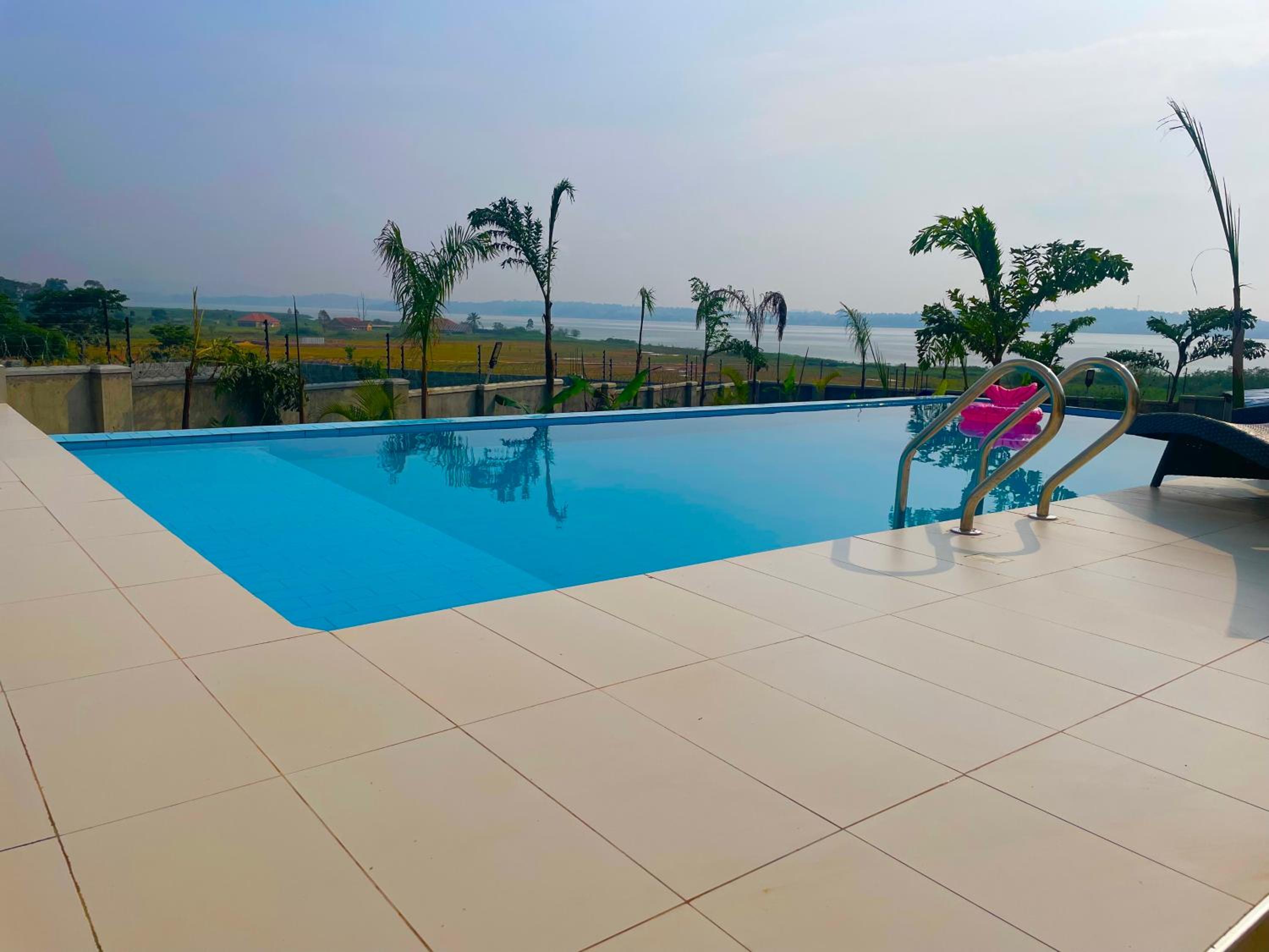 Infinity Pool Villas , Entebbe airport shuttle free parking private pool wifi 24 hr security