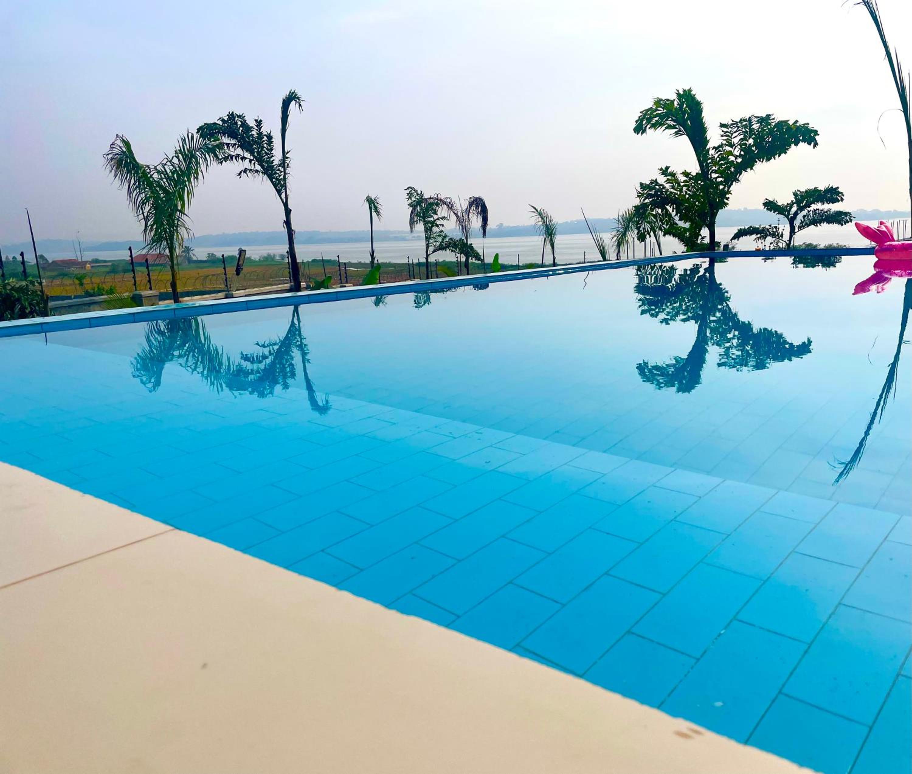 Infinity Pool Villas , Entebbe airport shuttle free parking private pool wifi 24 hr security