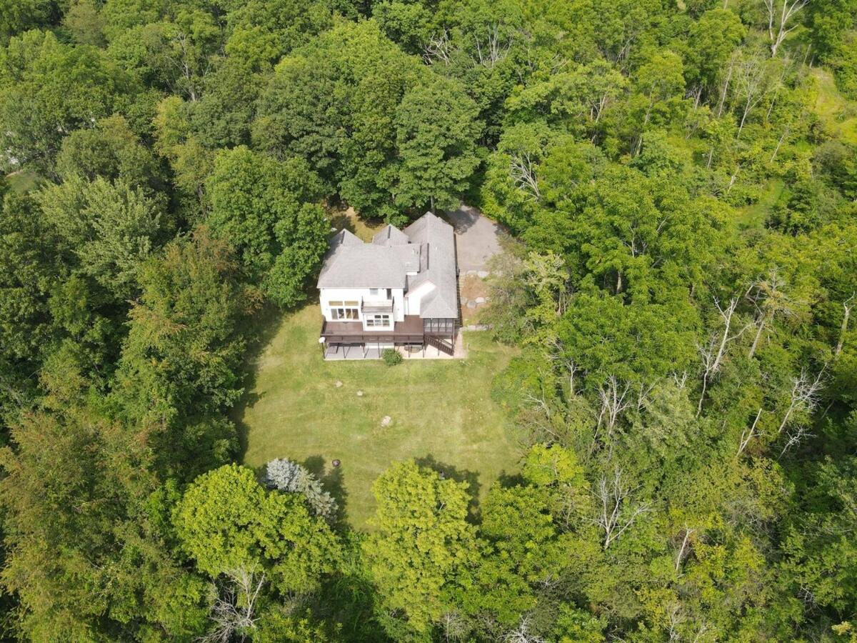 Secluded 4 bedroom with hot tub minutes from campus view 3