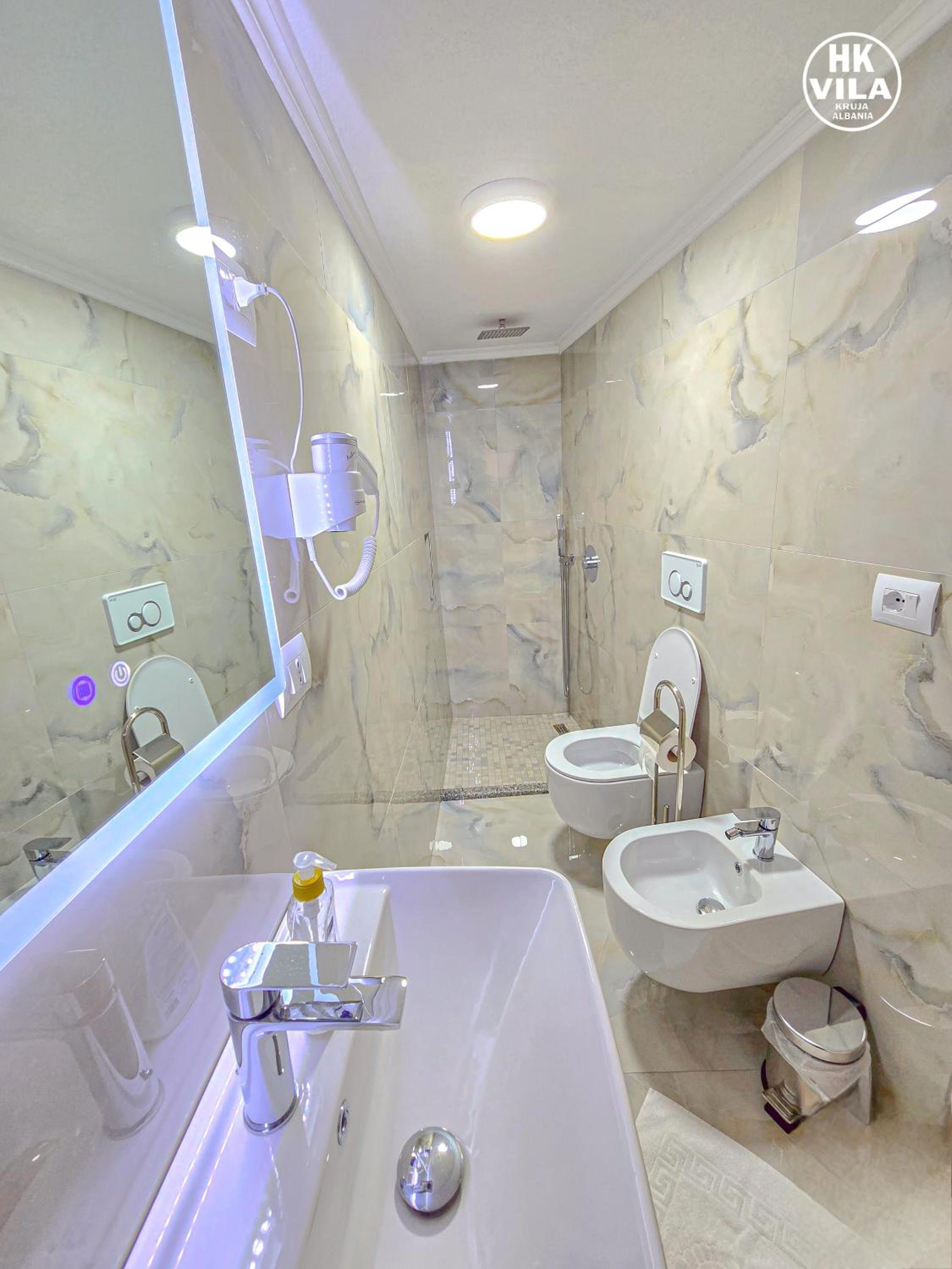 Vila HK is a cozy and welcoming house in the heart of Kruje It offers comfortable accommodation,free public parking nearby,and breakfast included,ensuring 
