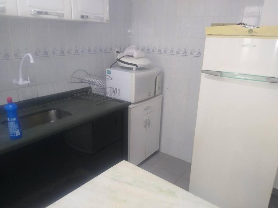Apartamento em condomínio de frete pra praia