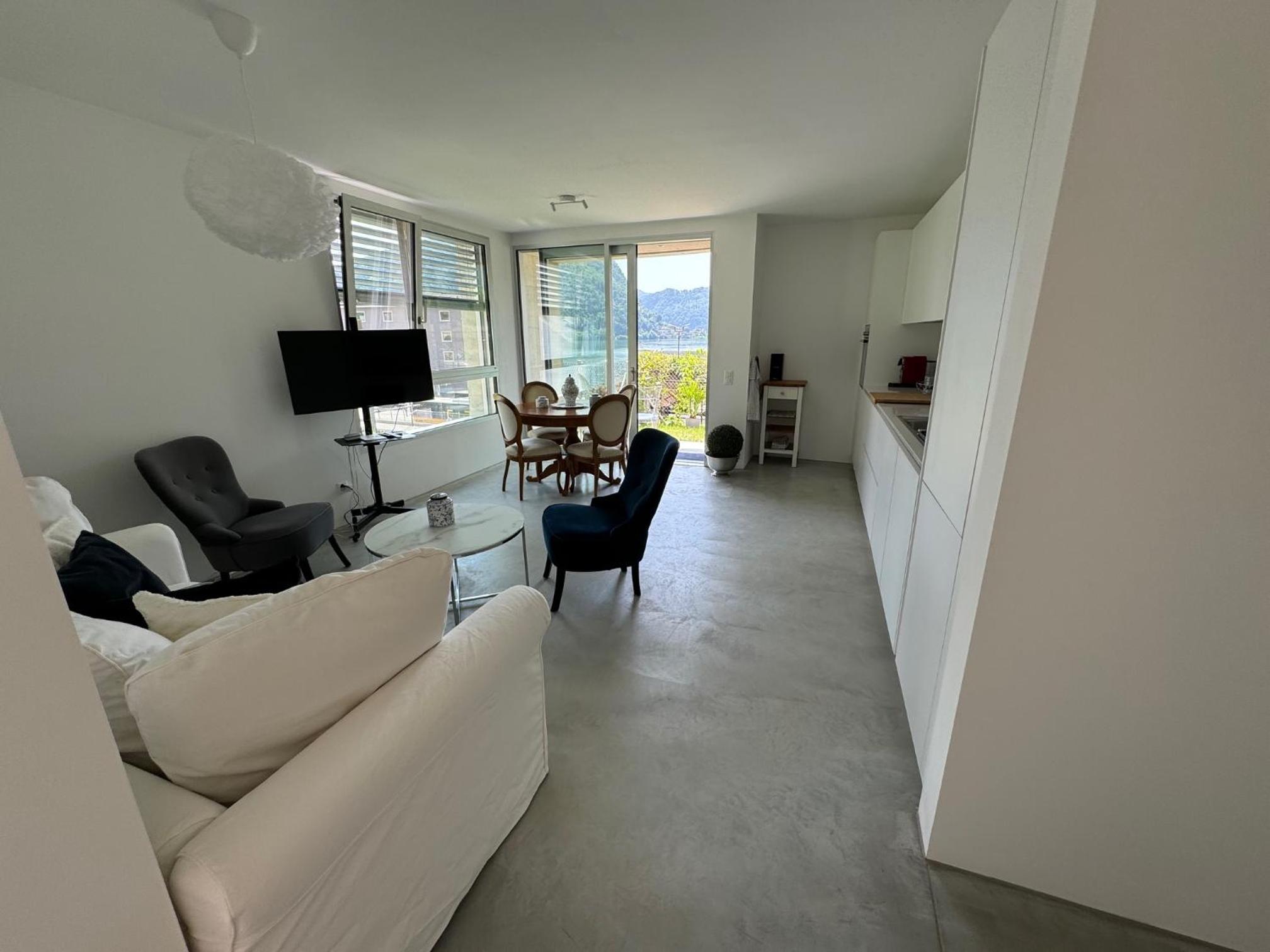 Neue Gartenwohnung mit Sicht auf den Luganersee