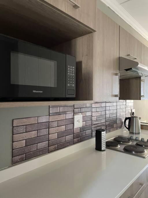1 Bedroom Sleek, Spotless, Work-from-home Sanctuary view 2