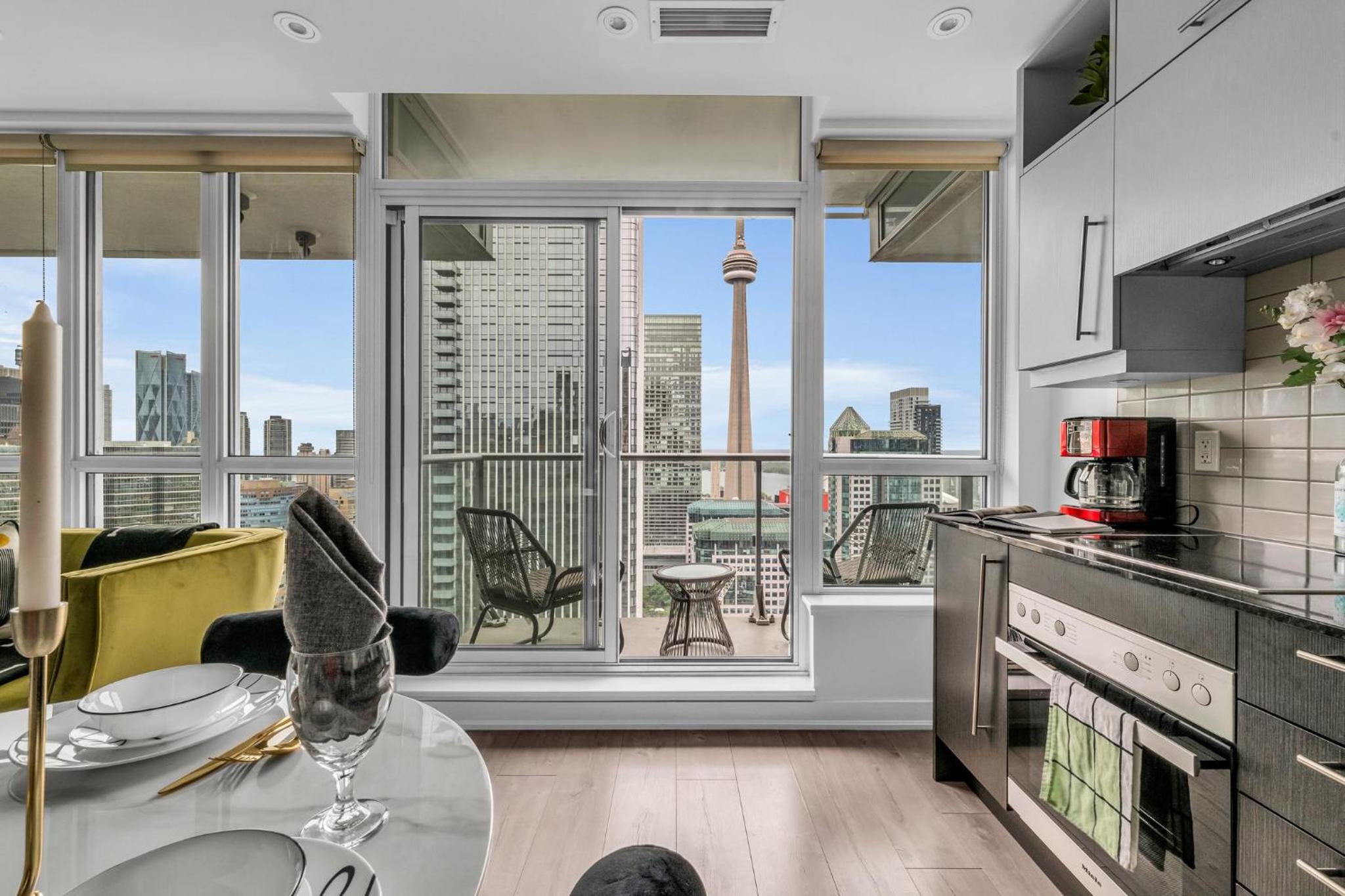 Deluxe 1BR Suite with bird's eye CN Tower Views