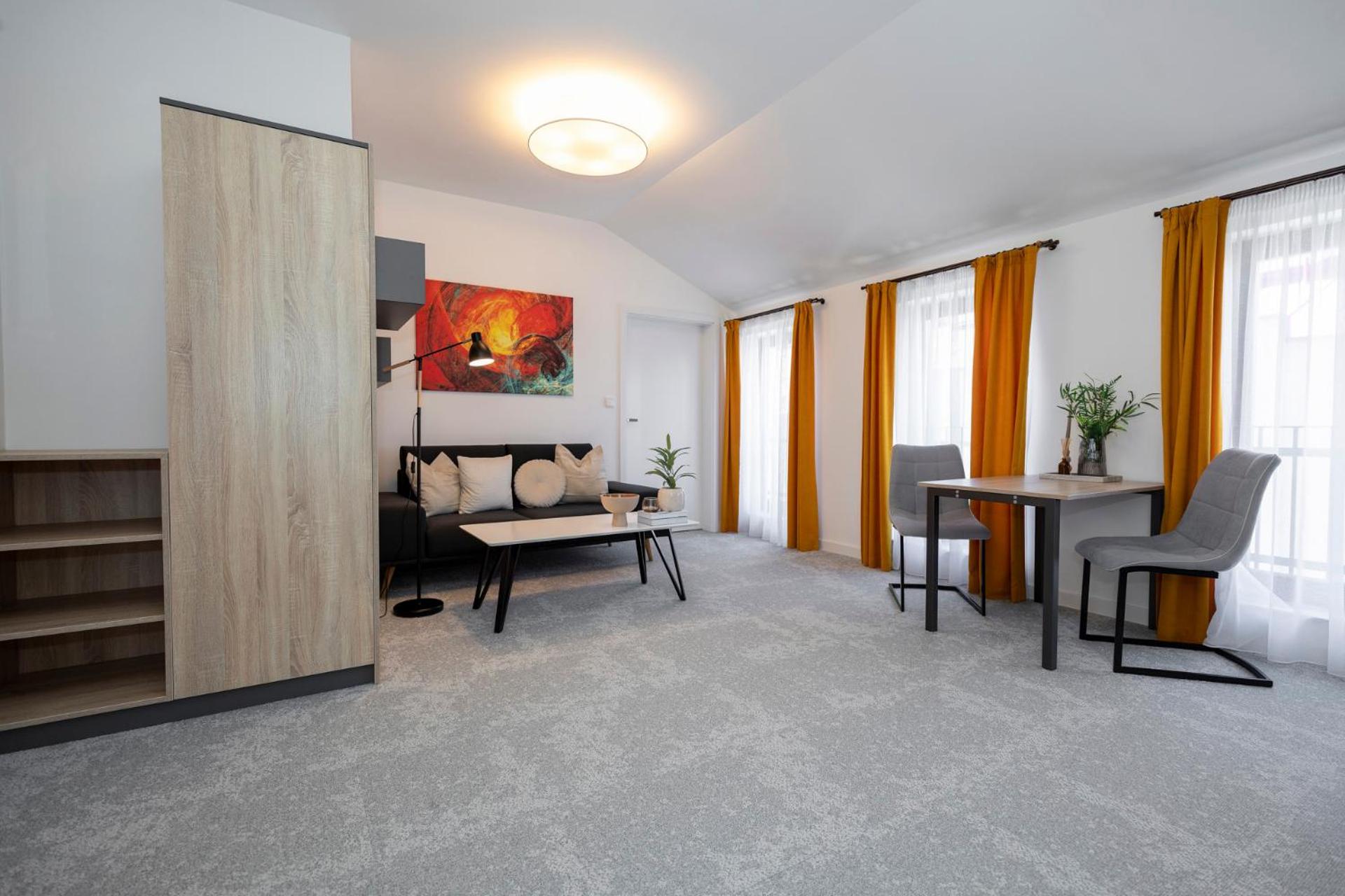 ALURE RESIDENCES 11 - 24h self check-in & private parking next to the apartment building included, CITY CENTER right on SNP Square in a quiet passage, new  view 5