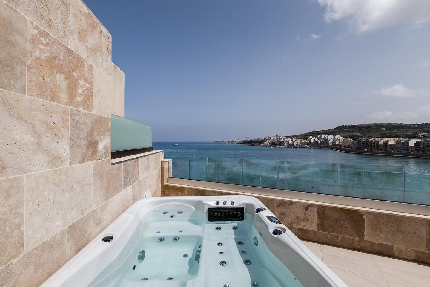DuplexPenthouse seafront with hot tub by Homely photo 1