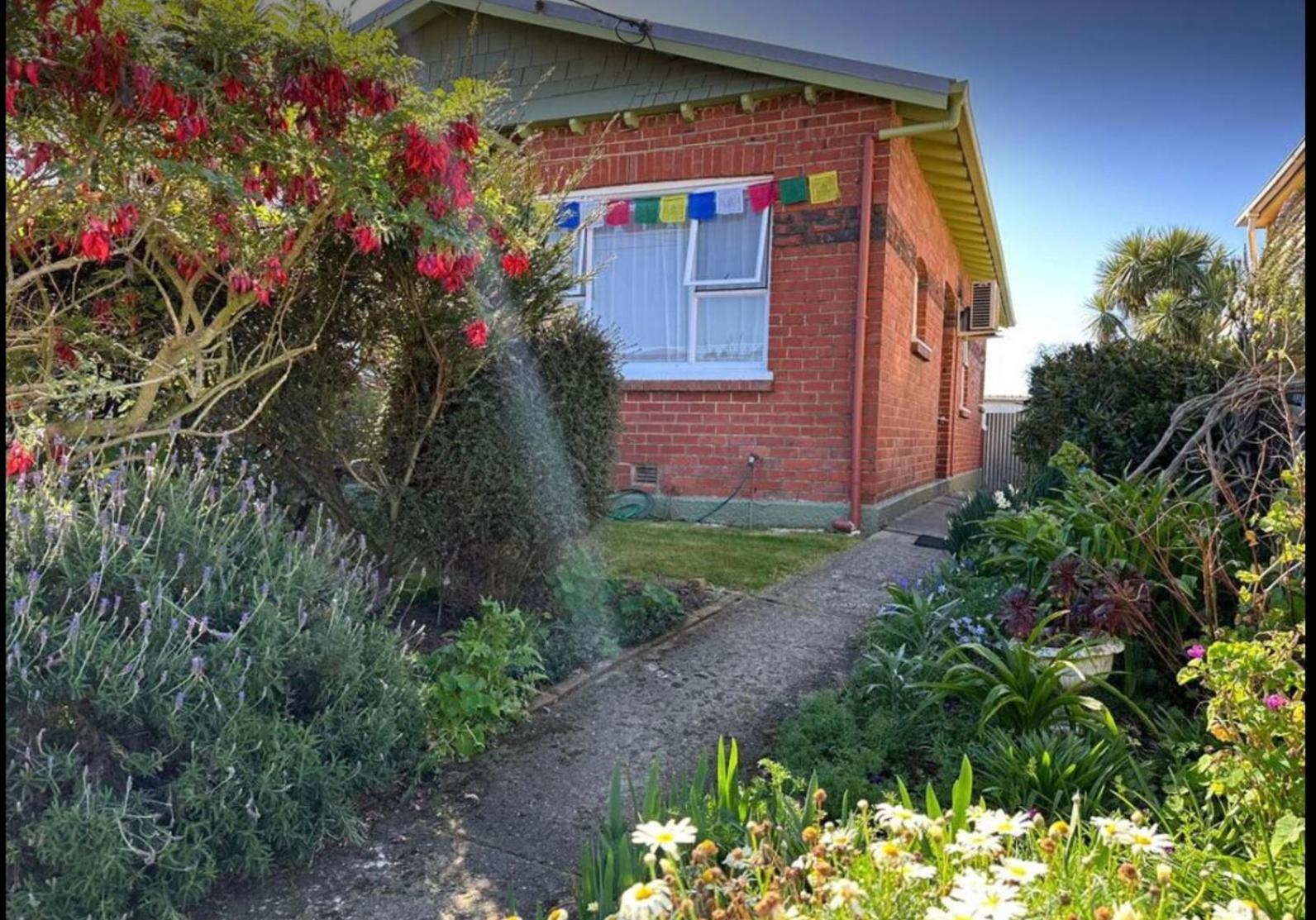 Cozy homestay room with garden view, free parking & fast Wi-Fi view 4