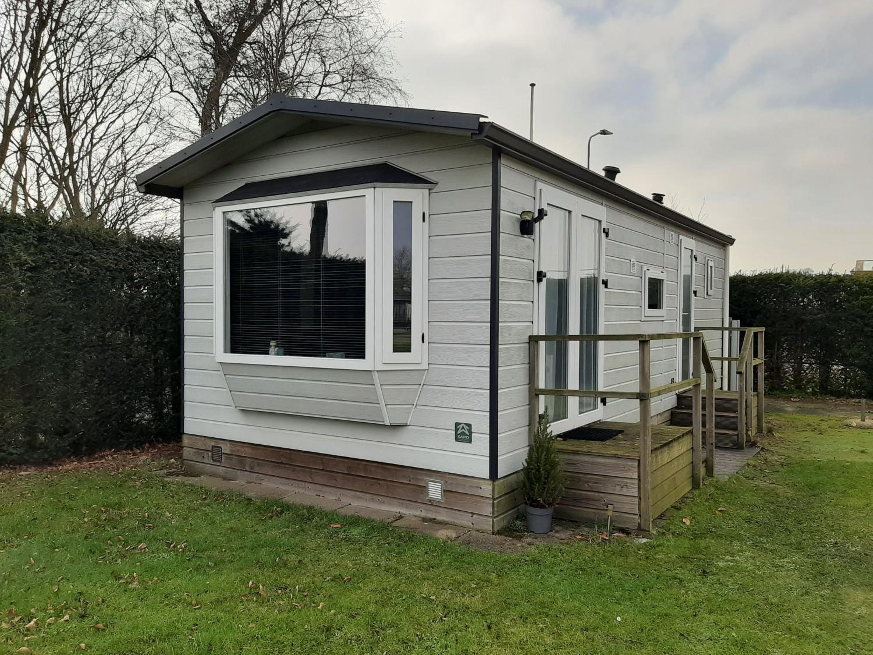 Chalet dichtbij zee en duinen view 5