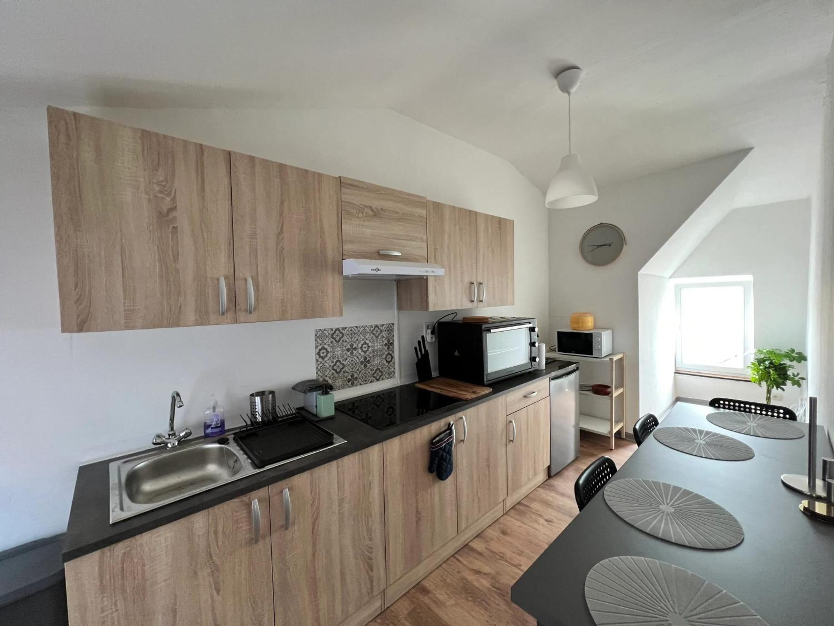 Charming Apartment in Liège City Centre with Parking Included