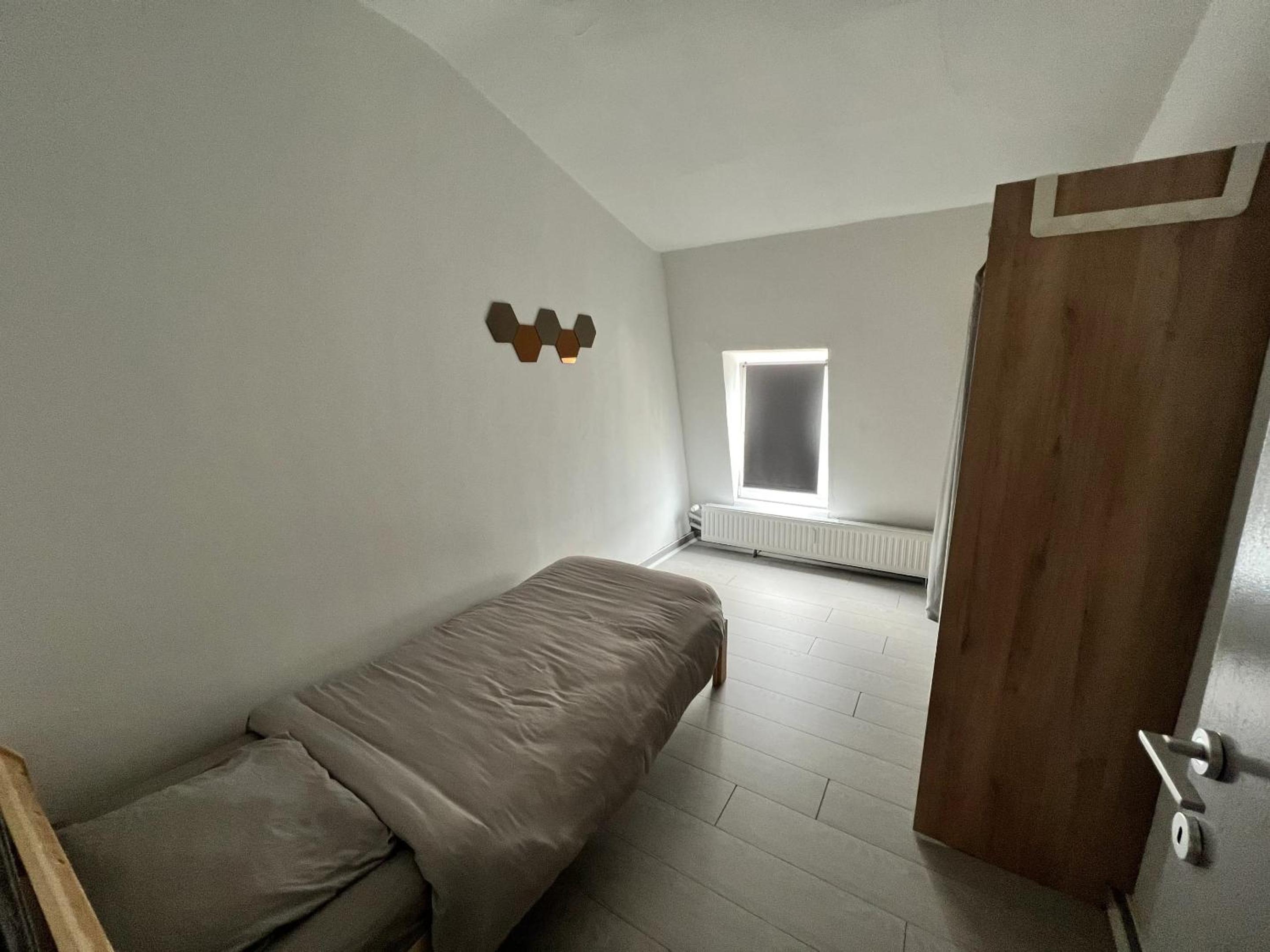Charming Apartment in Liège City Centre with Parking Included