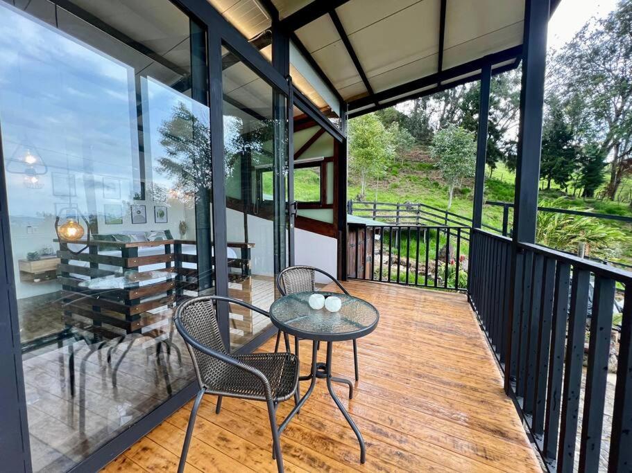 Luxury mountain top cabin steps away from Jericó