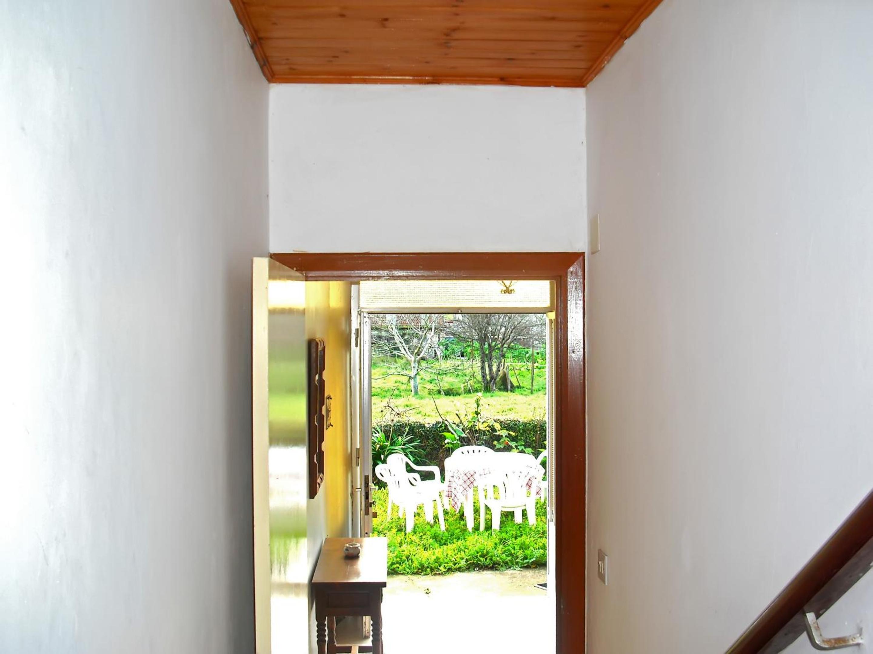 Charming house in Ourol with mountain view, large garden.