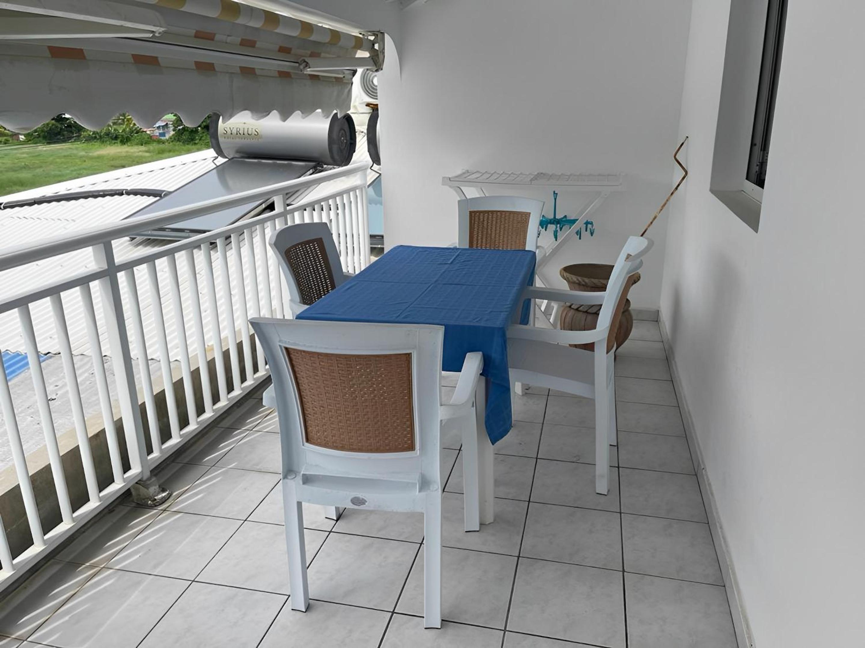 Appartement convivial au Moule avec jardin clôturé