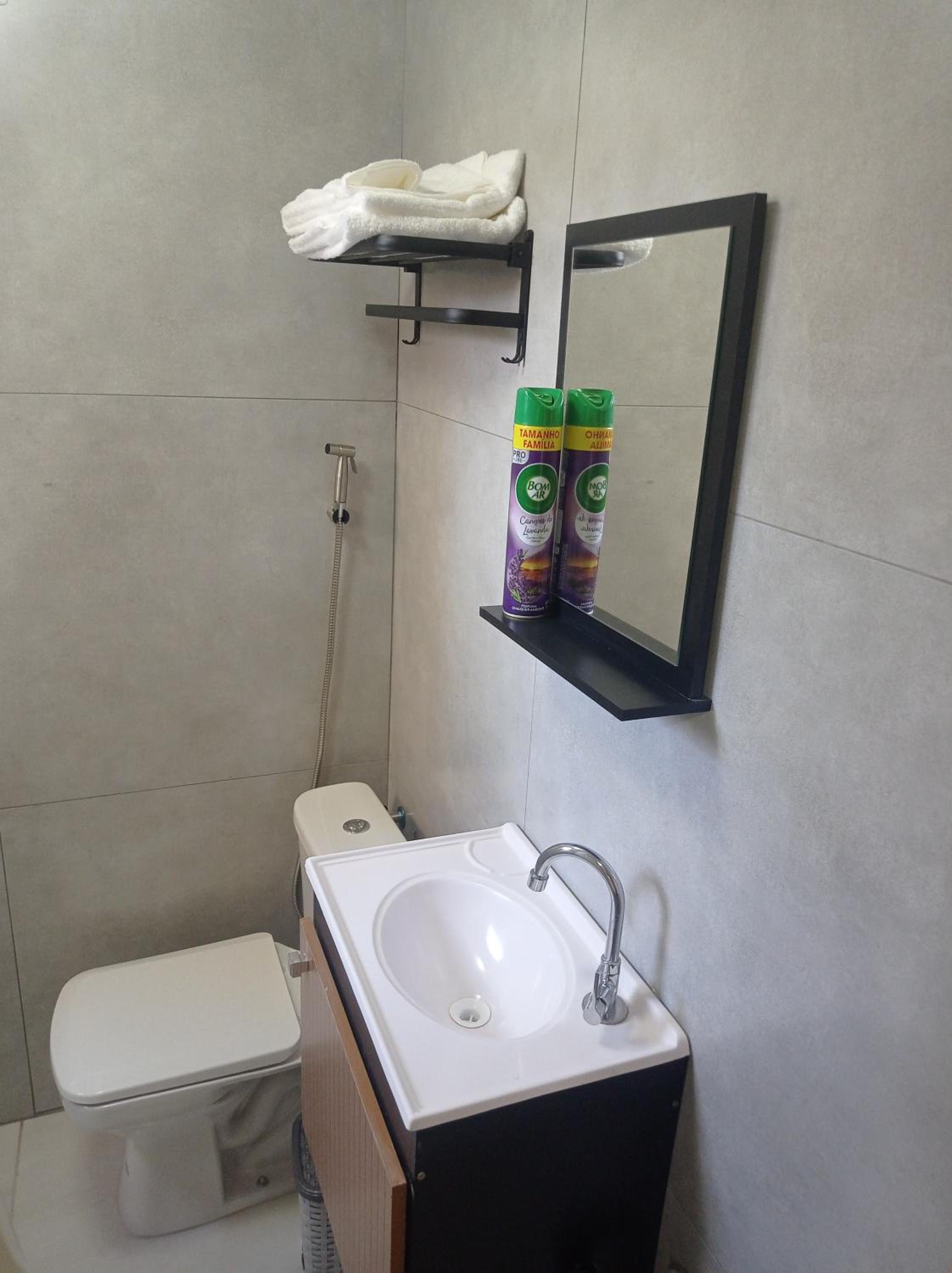 Flat na área central com AR-garagem-wifi-confortável