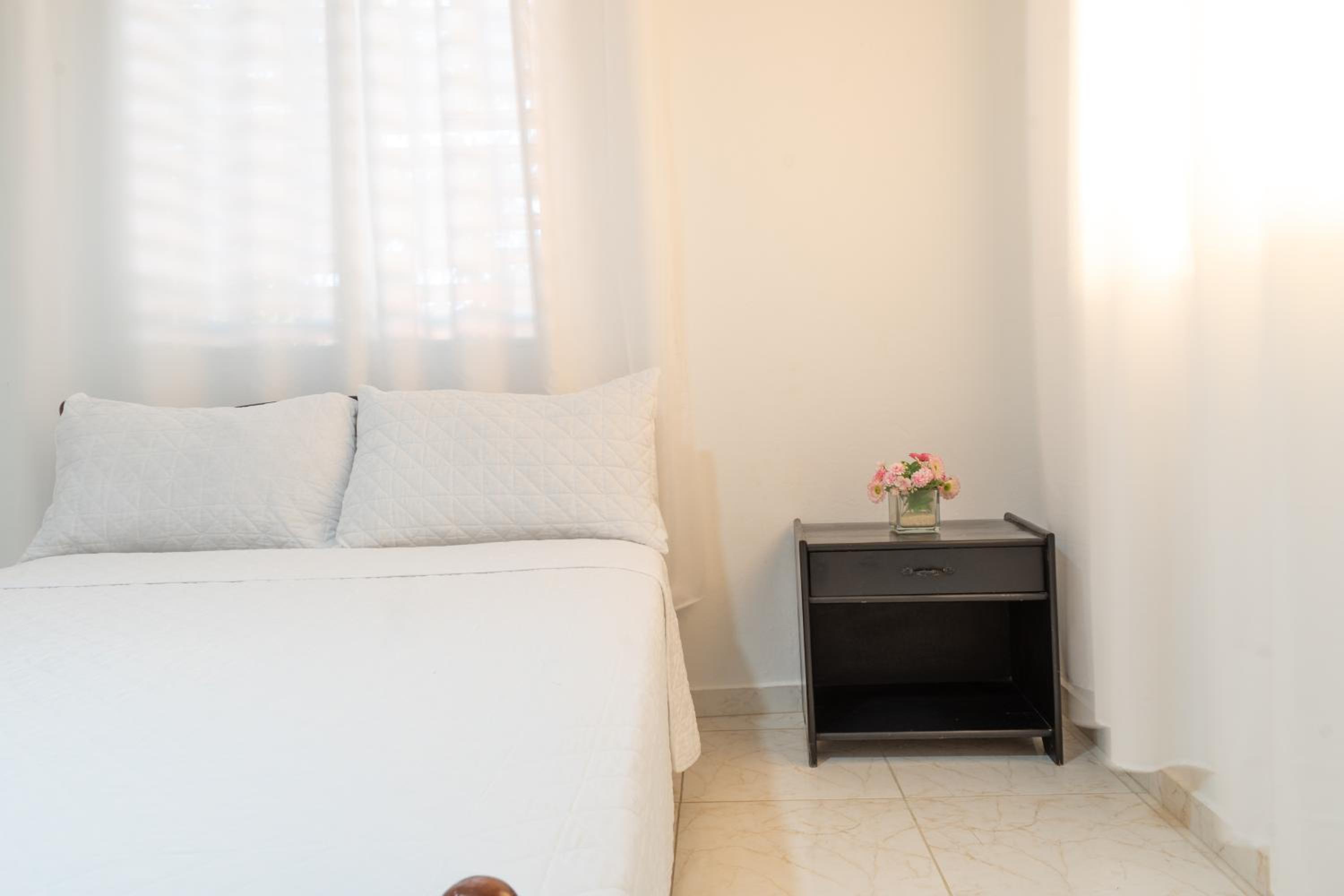 City Center 2BR Gem Urban Comfort view 3