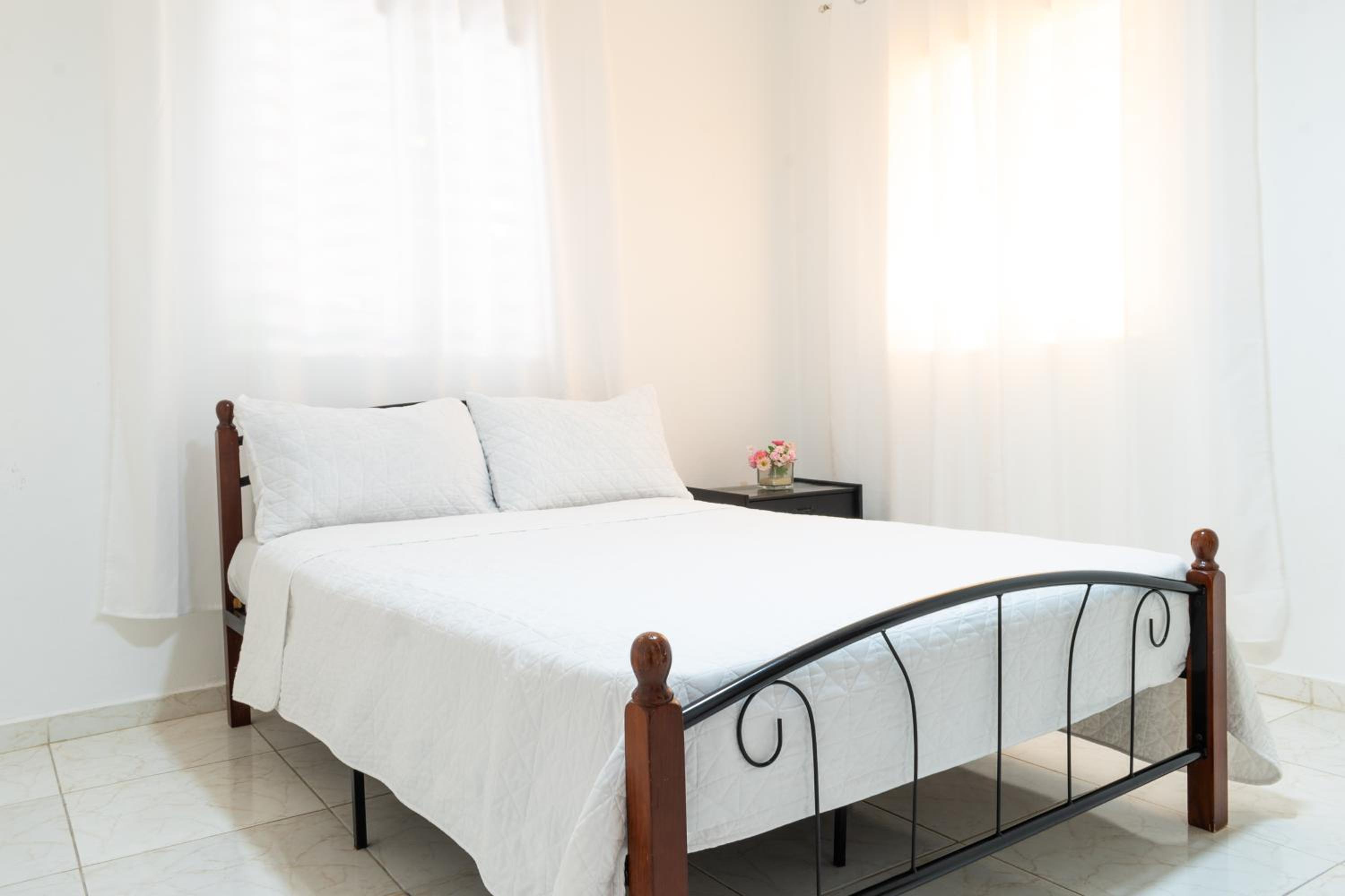 City Center 2BR Gem Urban Comfort view 4