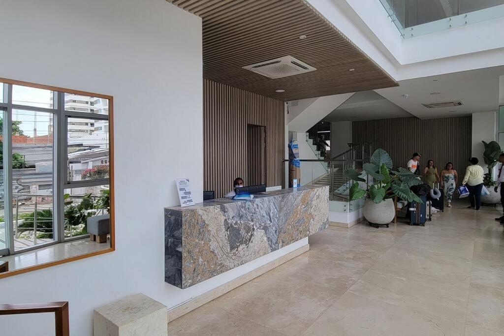 Stunning Infinity Pool, Balcony, steps from Walled City & Marbella Beach