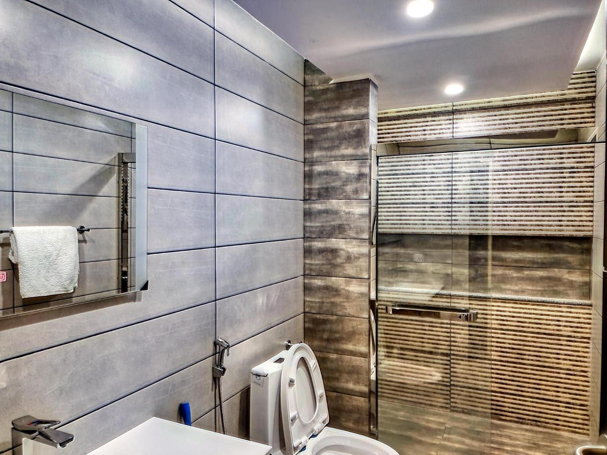 Comfort Inn 1BHK Elysium Tower Family Apartment view 3
