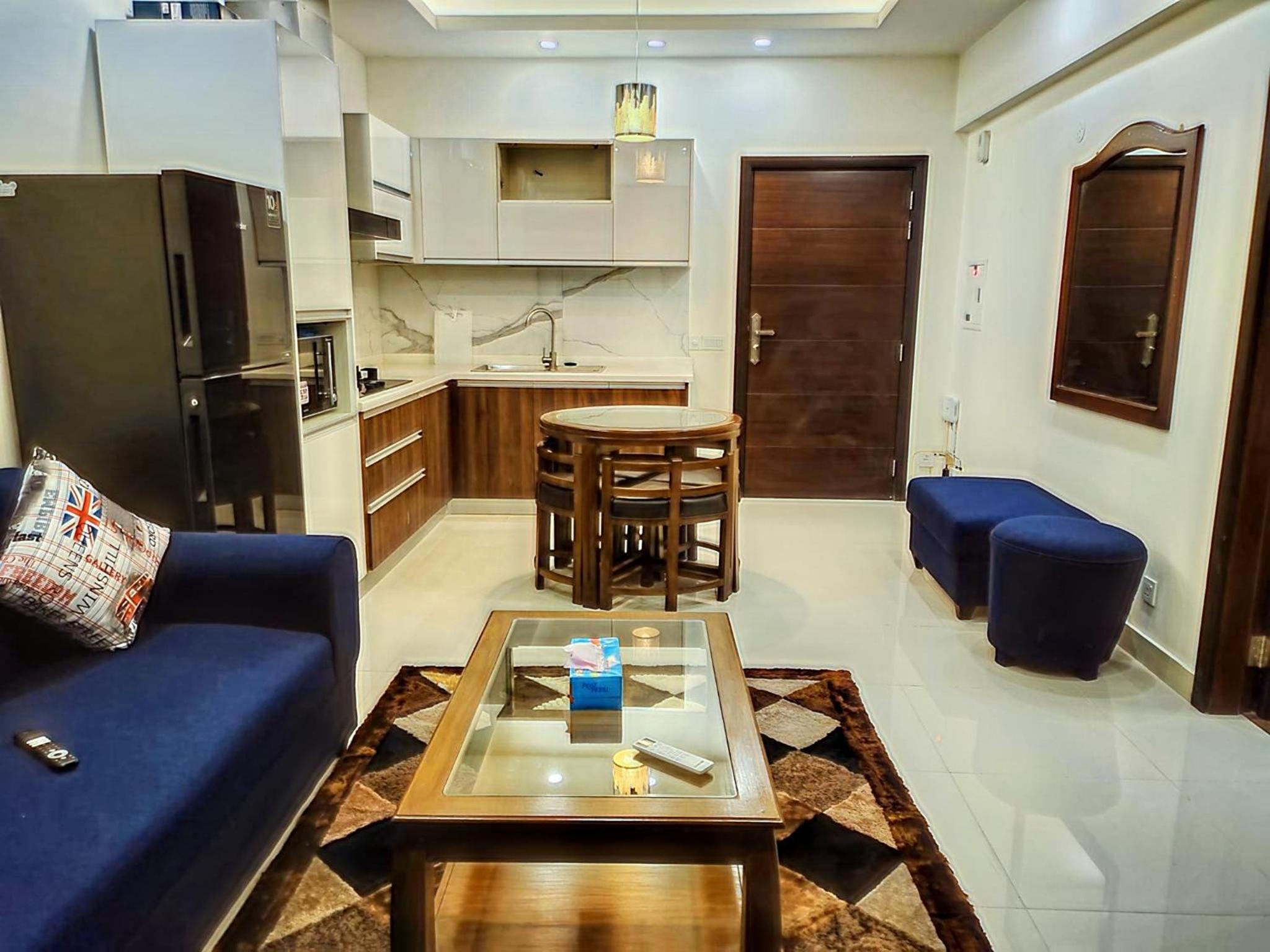 Comfort Inn 1BHK Elysium Tower Family Apartment view 4