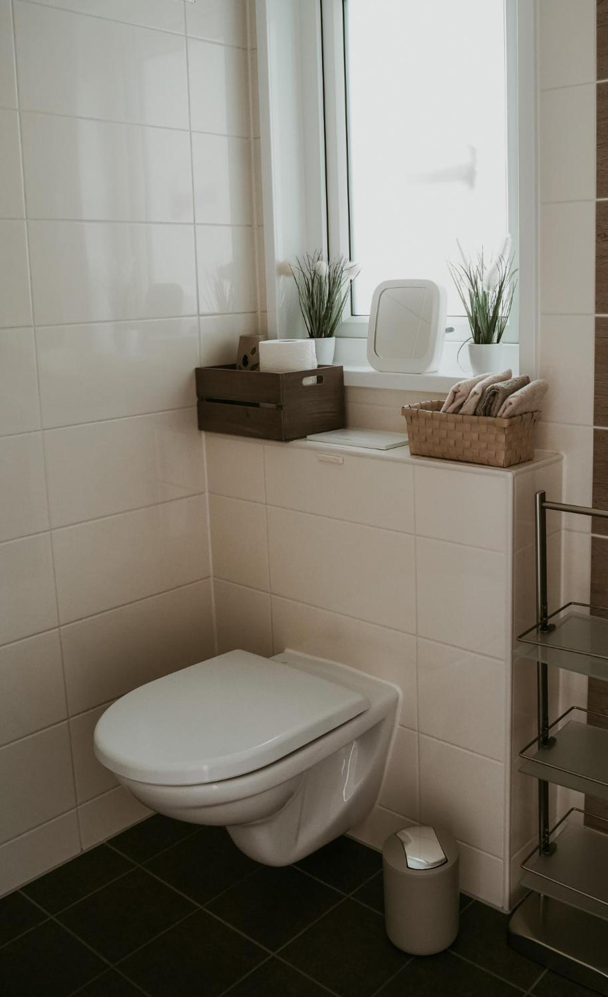 Ferienhaus Ufergeheimnis am Gülser Moselbogen I 2 SZ I 5 Gäste I Badebucht I Grill I Garten