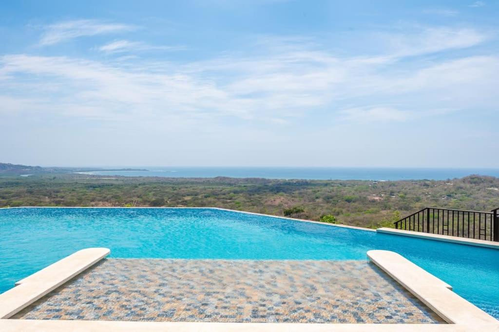 Luxurious Mountaintop Retreat with Ocean Views
