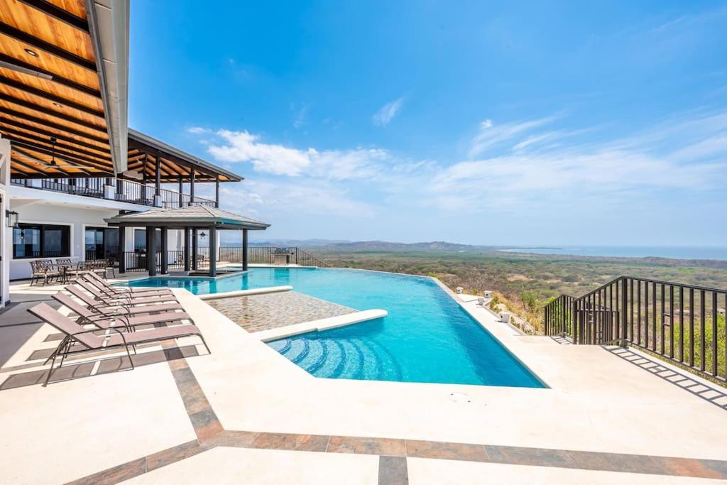 Luxurious Mountaintop Retreat with Ocean Views