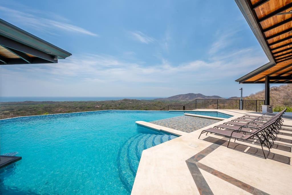 Luxurious Mountaintop Retreat with Ocean Views