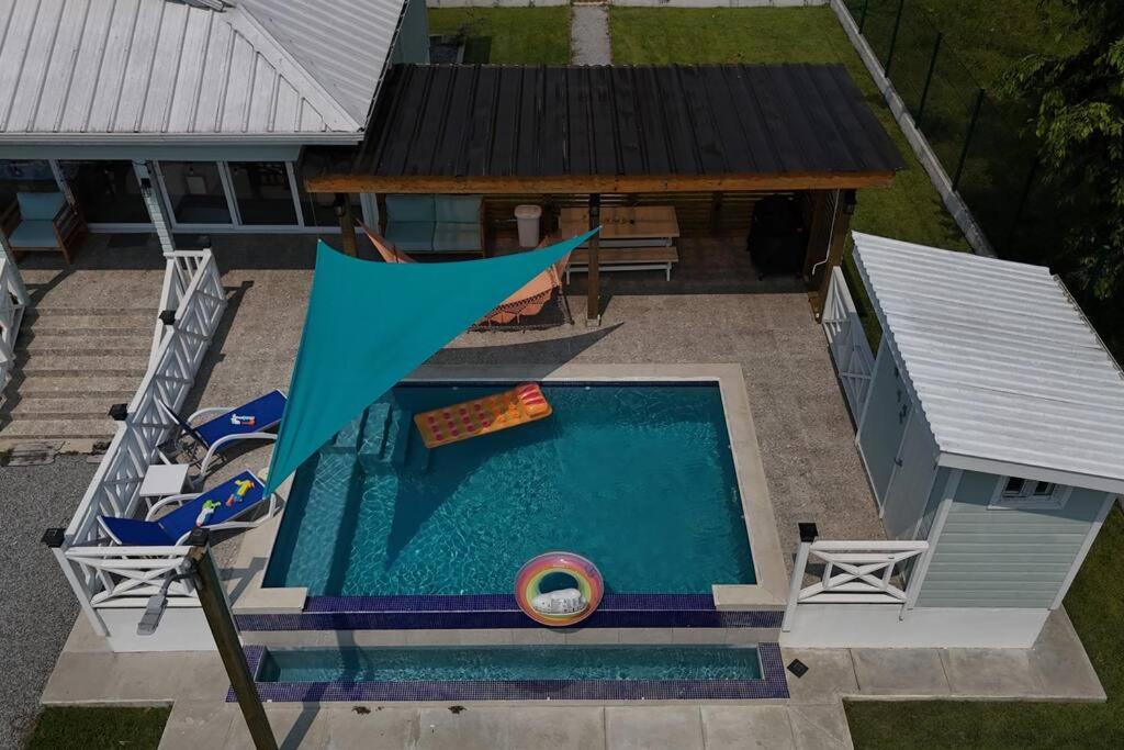 Acogedora Cabaña con Piscina y kiosco de playa