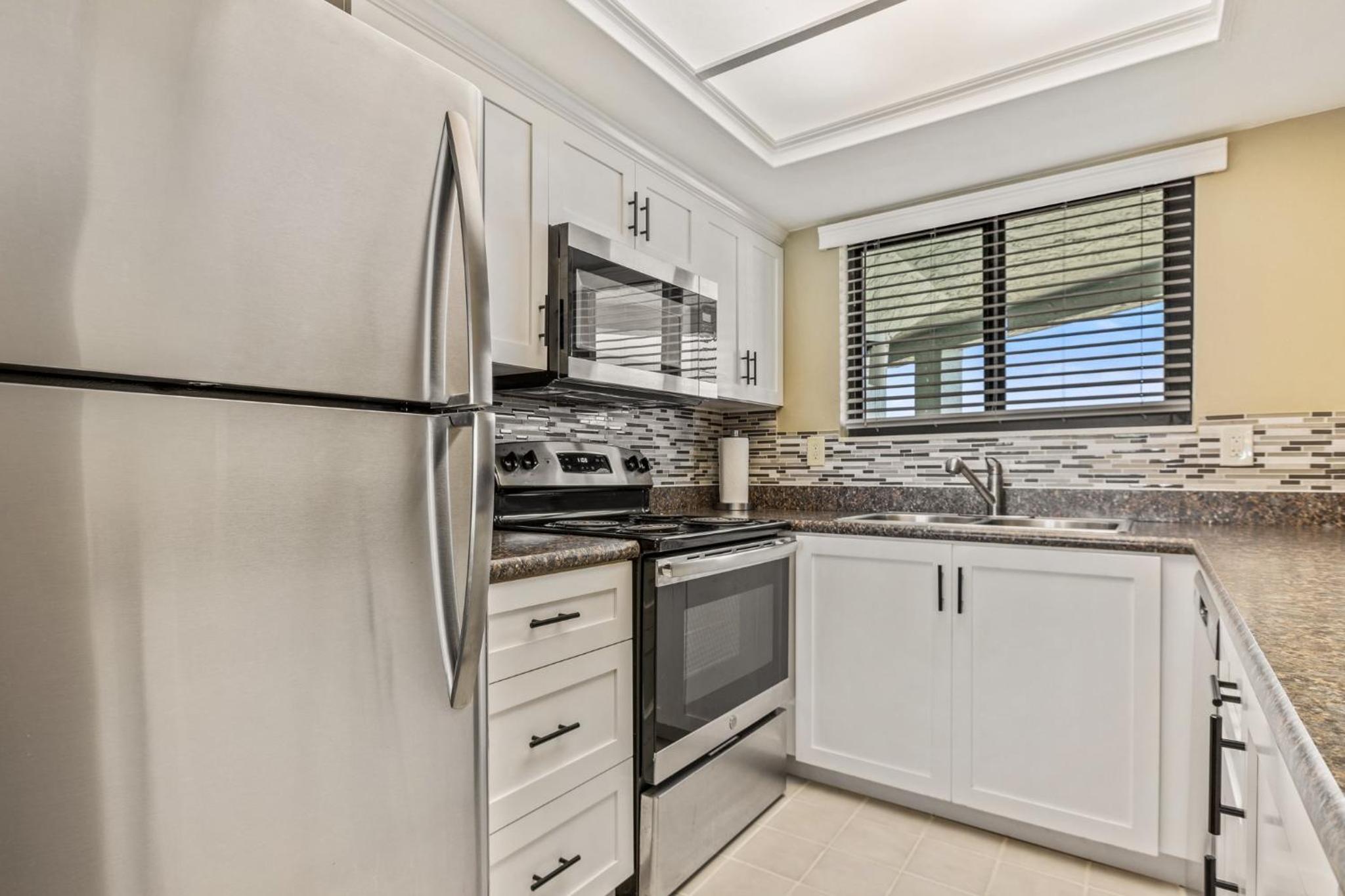 Ocean View with a beachfront pool at Ocean Trillium Condo ~ 702 view 4