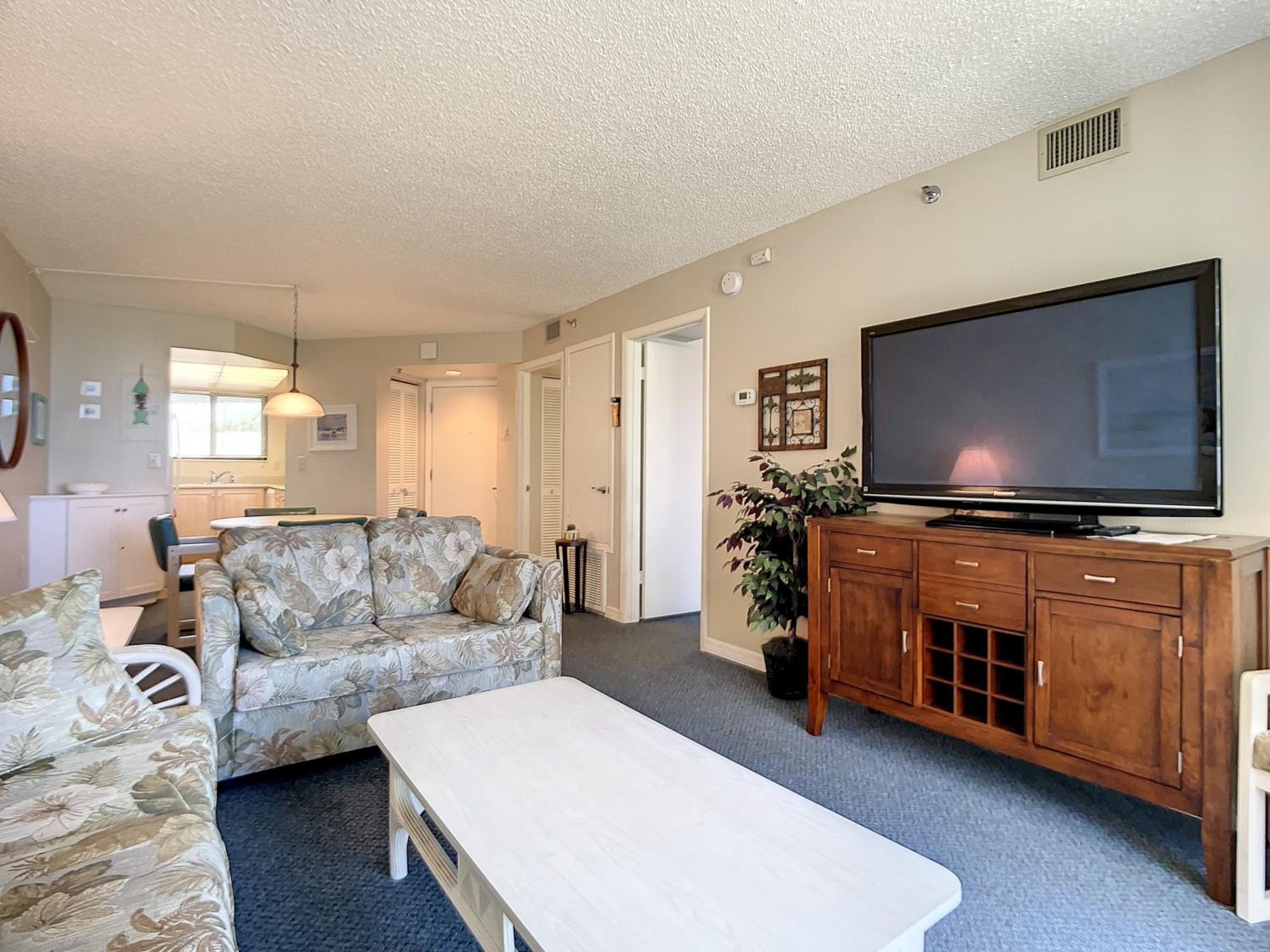 Beachfront with a pool at Ocean Trillium Condo ~ 101 view 4