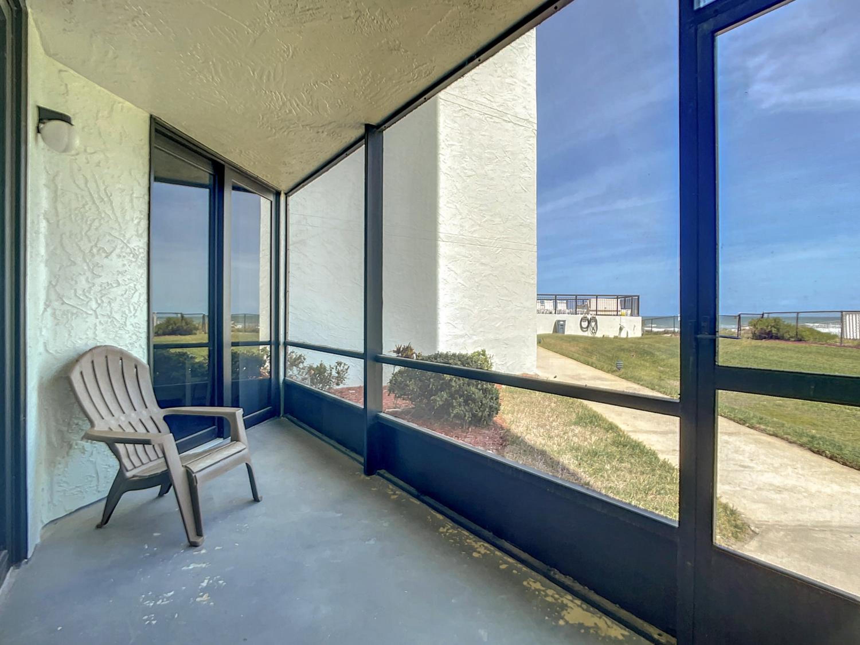 Beachfront with a pool at Ocean Trillium Condo ~ 101 view 3